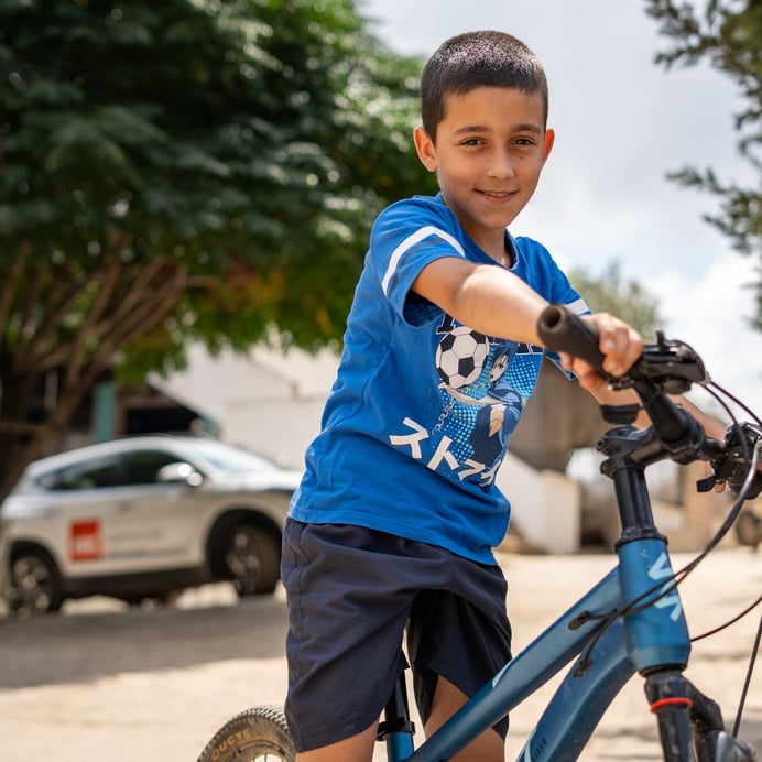 Louis, 9, can play with his friends in the village again. Photo: Tina Abu-Hanna/NRC