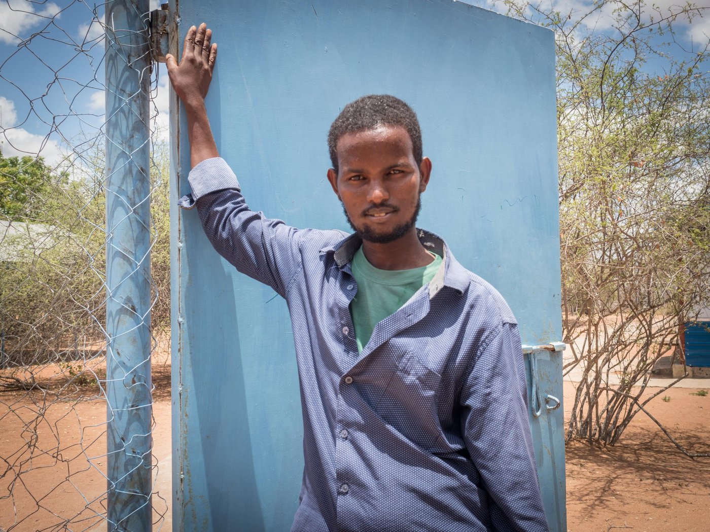 Ali Dimbil Ahmed (34) wants to return to Somalia after living most of his life in Hagadera camp in Dadaab Refugee Complex, Kenya. "I have more of a chance finding work in Somalia than I do here, I do odd jobs here in Dadaab but I never have a stable job. I will find a better job in Somalia," he said as he discusses the potential closure of Dadaab Refugee Complex and his reasons for leaving Dadaab now.
