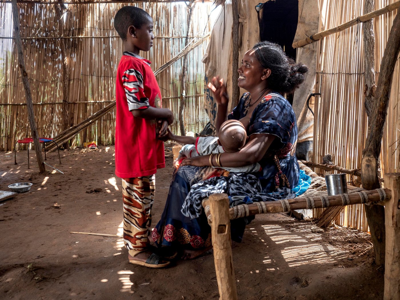 Rahwa was 8 months pregnant when the conflict in Ethiopia broke out. Her husband left to help his family, and Rahwa was left to decide the fate of her children alone. She had no choice but to flee to protect her children. Rahwa took her nine year old son's hand and walked for days until she reached safety in Sudan. One week after she arrived, Rahwa gave birth to her now one year old son. She is in constant worry for his future, and wishes peace would come in her country so she can give her children a stable life.
Photo credit: Ingrid Prestetun/ NRC