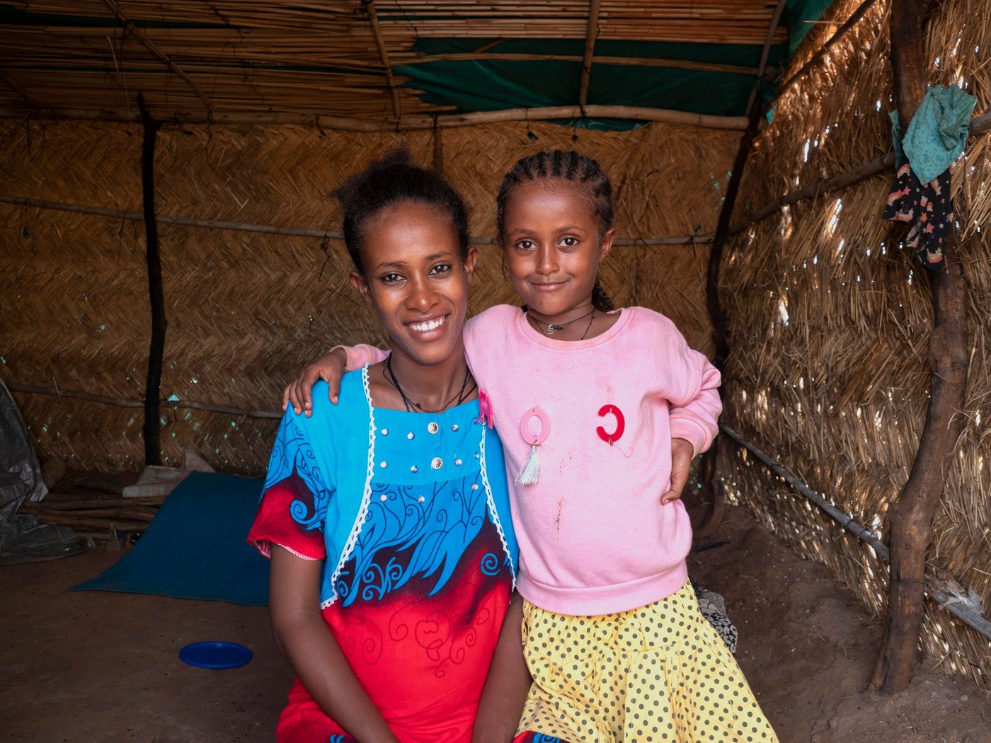 Nohel, 5, came with her parents when the conflict broke out in Ethiopia last November. Her father decided to go back and help his people in the civil war, leaving behind a pregnant wife and confused child.
"Everyday she tells me that she dreamed of her father the night before. She asks me when he's coming back and I don't know what to tell her," says Nohel's mother Abadit, 26.
Abadit hasn't heard from her husband since he went back to Tigray. She is 5 months pregnant, and she worries everyday for her daughter and the child on its way to the world.
Photo credit: Ingrid Prestetun
