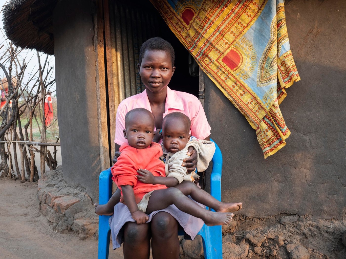 Athieng (20) student at the Accelerated Education Program in Nyumanzi, Adjumani District. Athieng fled from South-Sudan to Uganda in 2015 with her two brothers and mother, after first staying 2 years in Kenya. They live 25 km from the border to South-Sudan.
In Nyumanzi Settlement in Adjumani, Uganda Athieng gave birth to twin daughters in 2019 and her mother is taking care of them while Athieng is in school. Her father is still in South-Sudan.
Athieng is now attending last year of primary school in NRCs Accelerated Education Program. She and her 14 year old brother is attending the same class. AEP in Nyumanzi has more than 200 students from the age of 10 to 20 years. Athieng has a dream to become a nurse in the future.
Location: Youth Center in Nyumanzi Settlement, Adjumani District, Uganda
Photo: Ingrid Prestetun/NRC