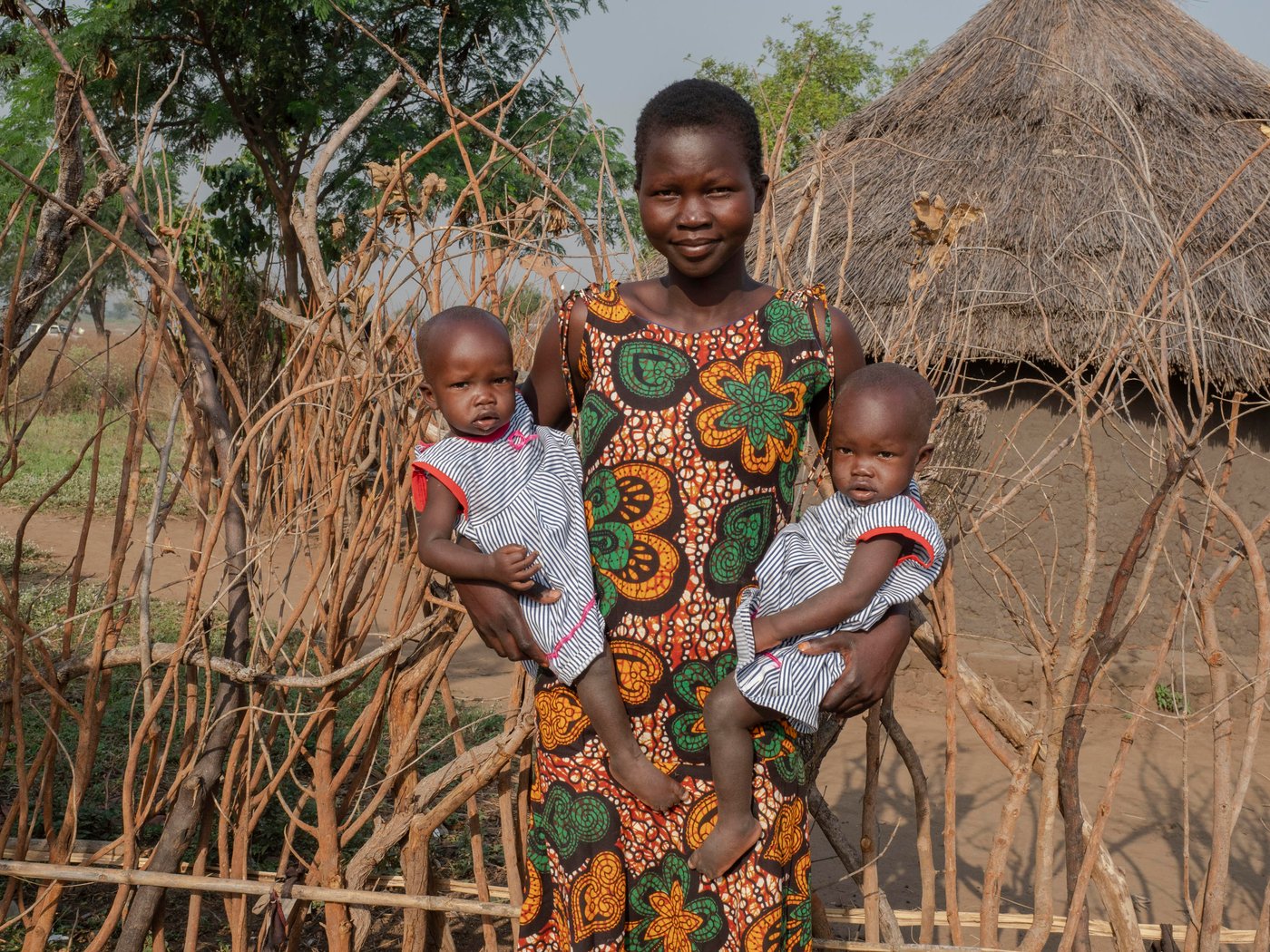 Athieng (20) student at the Accelerated Education Program in Nyumanzi, Adjumani District. Athieng fled from South-Sudan to Uganda in 2015 with her two brothers and mother, after first staying 2 years in Kenya. They live 25 km from the border to South-Sudan.
In Nyumanzi Settlement in Adjumani, Uganda Athieng gave birth to twin daughters in 2019 and her mother is taking care of them while Athieng is in school. Her father is still in South-Sudan.
Athieng is now attending last year of primary school in NRCs Accelerated Education Program. She and her 14 year old brother is attending the same class. AEP in Nyumanzi has more than 200 students from the age of 10 to 20 years. Athieng has a dream to become a nurse in the future.
Location: Youth Center in Nyumanzi Settlement, Adjumani District, Uganda
Photo: Ingrid Prestetun/NRC