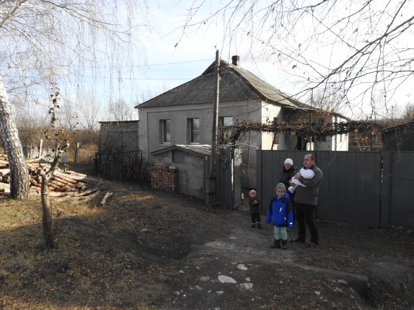 Serhii, 38, and  Olha, 41, bring up six children. They live in a small village of Nyzhnie along the contact line in Luhansk region. 
“In the beginning of 2019 we received assistance in insulation of the house for more than UAH 50,000 (USD 2,000). We would never have done this without external help. Now we notice that the temperature inside keeps up to 22 degrees Celsius even when it is 10-15 degrees below zero outside. We have significant savings in coal using only eight kilos a day. Moreover we permanently solved the problem with mold groving on walls which existed for several years,” says Serhii Ivanchenko, 38, Olha’s husband.
Photo: Violetta Shemet/The Norwegian Refugee Council (NRC)