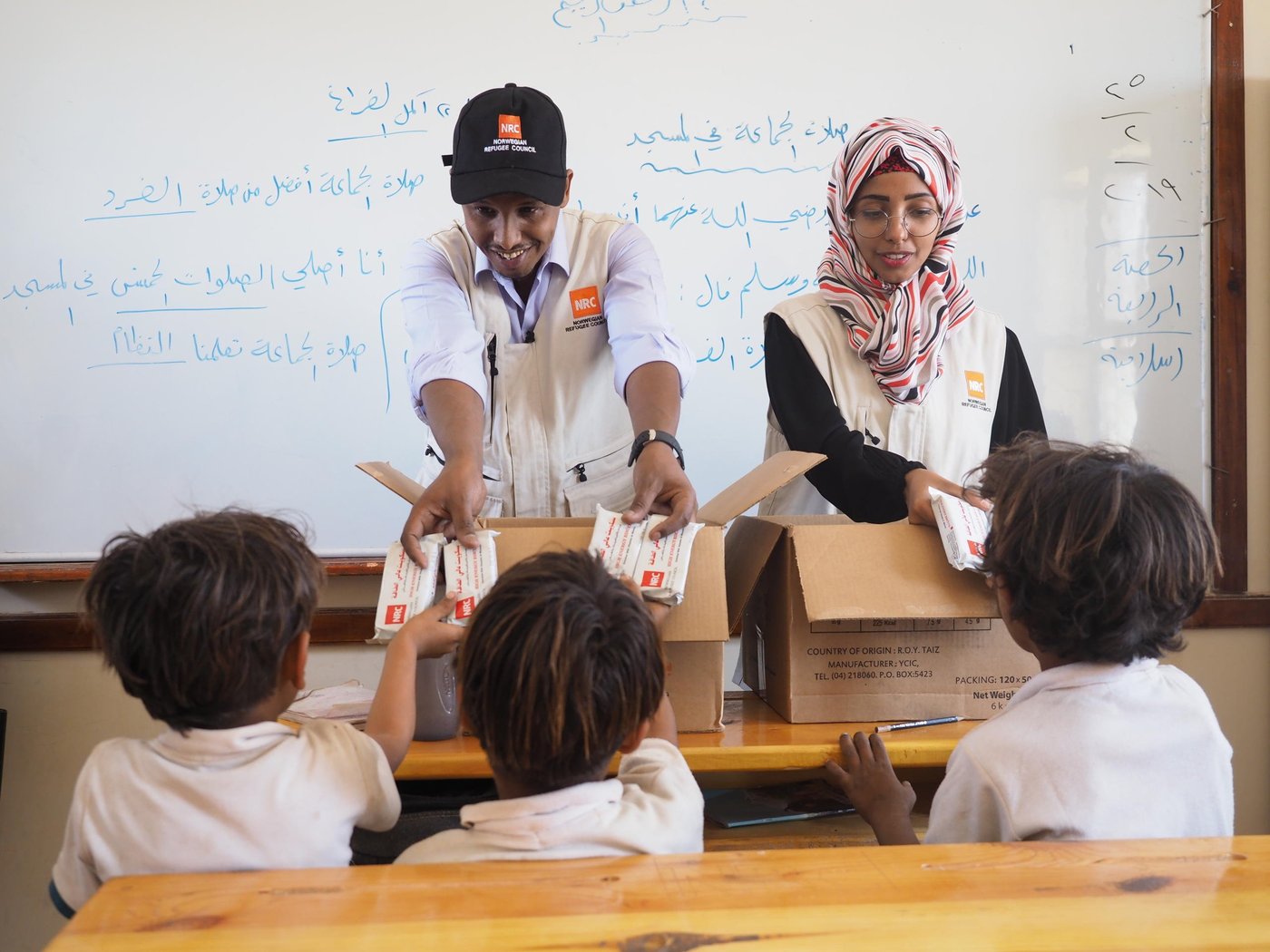 Malka Mohammed:

NRC’s education assistant in Aden, Malka Mohammed (26), remembers March, 2015 as a time that turned from being a joyful month of celebrations and weddings into a living nightmare. She was working as an English teacher in her home city of Aden when a colleague ran to her classroom, knocked madly on the door and shouted: “They’re attacking the city!” 

“We evacuated the school. There was a lot of confusion. There was shooting everywhere,” she recounts. Over the next few weeks, it got worse and the fighting drew closer to Malka’s home. 

“Every day, I heard stories of how people had been killed, and I saw the remains of destroyed buildings. It scared me to death. I was particularly afraid during those early morning hours when the airstrikes would begin.”  She remembers one day waking up to the screams of the little girl next door. “I ran out to the street without wearing my abaya or even a scarf on my head. I was running like mad and the street was full of people. It felt like the end of the world, the sky was covered in red lightening.”

Malka and her mother ran as fast as they could. They eventually reached a house at which they felt safe and were welcomed in by the people living there. They stayed until the next morning. 

A stranger helped Malka that day. Now, she is helping others. 

As an education assistant in southern Yemen, her job is to make sure children living in conflict can still access school. Through our education work, we rehabilitate and rebuild schools destroyed by shelling and other attacks, we distribute school materials, teach teachers and organise school meals.

“We cannot lose education in Yemen. If we lose education, we can lose a whole generation,” she says, and continues: “Education is so important, and that’s why we try to support young Yemenis to create a better life for themselves, and a future.”


Yasin Ismail:

Yasin Ismail has been working for NRC for five years and believes NRC is one of the best organisation to work for. Yasin started working for NRC as an education assistant and is now an education coordinator at NRC's Aden area office. 

Yasin believes education is a critical component of the workNRC does, because of its great impact on people’s lives. He recognises it as a basic human right, important to the development of children and youth to fulfil their potential, and critical to breaking the intergenerational cycle of poverty. 

The impact of the conflict in Yemen has been catastrophic. Schools have been destroyed or occupied by armed groups or displaced populations, which have deprived children in some areas from accessing school for more than four years. 

Children in Yemen are struggling to cope with the violence they have faced during the conflict, and continue to face imminent danger as conflict carries on and exposes them to UXOs, mines and crossfire.

Yasin believes the security situation, which results in restricted access and unpredictable funding for education, are two of the main challenges in his job. He said that affected communities need access to aid but will sometimes have challenges accessing this due to long delays at checkpoints or challenges reaching distribution sites.

Yasin wants to help and support those affected by war in Yemen and believes that we can change the world with education.  “[We should] Always follow our dreams and believe in ourselves. For every ending - there is a new beginning, for every memory - there is a dream ahead.” 

"I hope for peace and stability for our people and country. I hope for our children and youth to get quality education because that will help them to build their future. I believe the education is the only approach to protect future generations, because it gives people a chance for healthy development, restores a sense of normality, and provides important life skills. Further to that, an education intervention is an investment in the long-term future, and in the peace, stability and economic growth of Yemen”.



More information:
These kids, like many others, leave for school very early because it takes them an hour - or as long as two hours for some - to walk! Ensuring children have sufficient access to nutrition is very important for children expending huge amounts of energy on commuting, learning and playing, and ensures they are able to engage appropriately in class. Lialy was among the children without anything to eat before coming to school. NRC has started to provide high energy biscuits to children in Lialy's schooll, who  expressed their happiness at receiving the biscuits. Several children mentioned feeling more energetic and active as a result, and said they could concentrate more in class. 

Info about the school:
Al-Qadisia school is located in Al-Qubbiyta district in Lahj and was one of the first schools in which NRC has delivered programs. NRC's team describe the AlQadisia as a normal school with an engaged community but problems including nearby landmines. As displaced families continue to move into the area, the number of students at the school continues to grow, creating congestion. NRC's program at is supporting rehabilitation of the school building, distribution of recreational, cleaning and scholastic materials, capacity building of teachers and provision of high energy biscuits for students. 

Education in H2R:
One of NRC’s global priorities is to deliver aid and services to people in hard to reach areas. We worked with the Education department to select this school and others identified as being among the most in need. In travelling to the school form NRC's office in Aden, staff encounter several checkpoints, threatened areas and landmines. 

Our programming in Yemen's southern governorates reaches people in Lahj, Abyan and Al-Dalea, among other areas. Operating in these areas is complicated and challenging: our staff travel through hostile checkpoints, some of which return traffic, preventing access to project sites. Several areas remain affected or threatened by conflict, explosions are often heard, landmines dot areas across Yemen and bureaucratic challenges delay or complicate processes. 

Where mines do explode, civilians can be punished severalfold as people can not only sustain injuries, but lose mobility and access to fields and other sites used for cultivation. 

Efforts should be made to call on the authorities and specialised organisations to strengthen demining operations and reduce the number of civilian casualties.   

Photo: Ingrid Prestetun/NRC