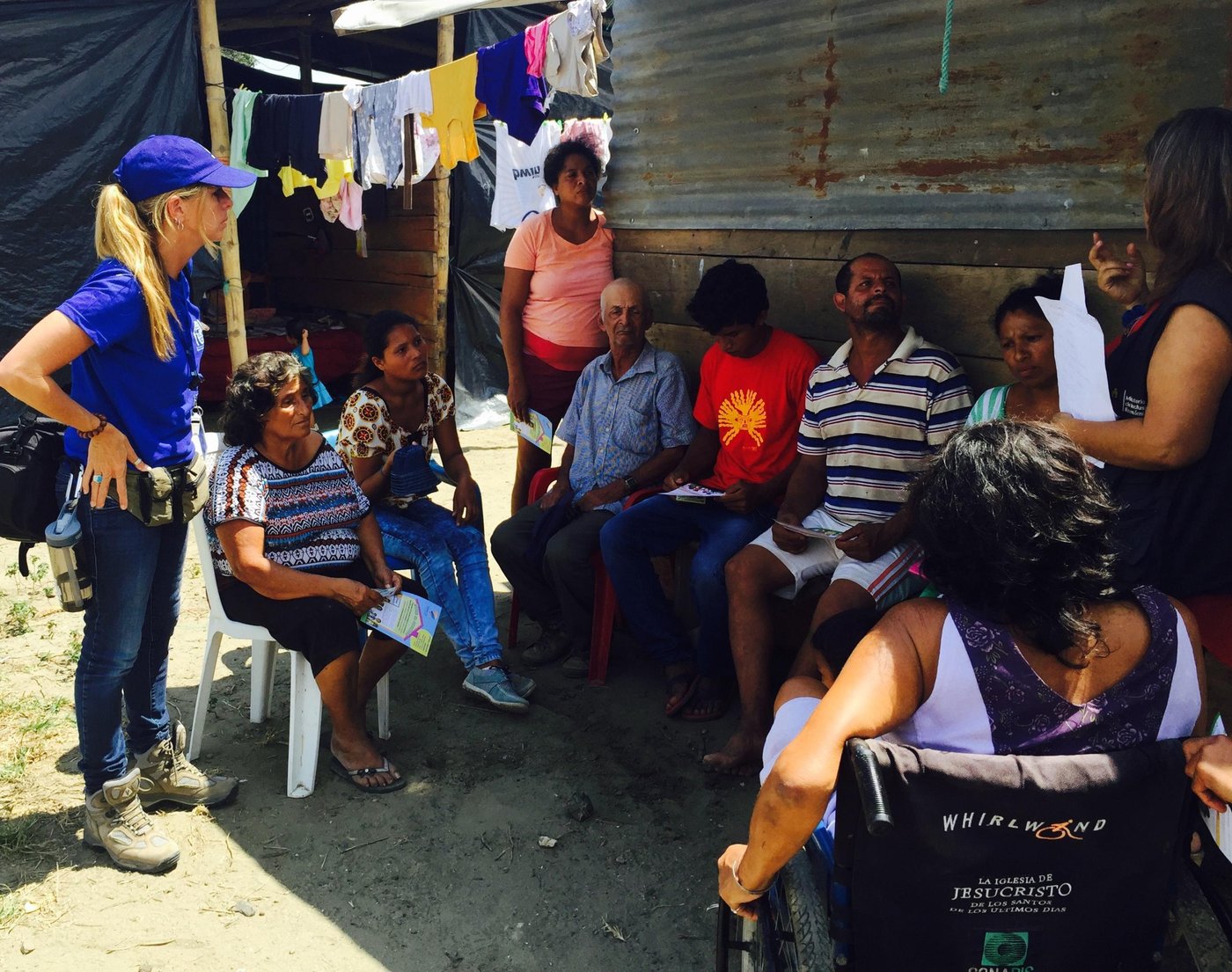 NORCAP/IOM Communication with Communities specialist Fernanda Baumhardt at an urban spontaneous settlement of Pedernales, one of the most affected towns of the M7.8 earthquake, supporting MIES (Ministry of Social and Economic Inclusion) during a community dialogue on government’s emergency programs. The goal was to go beyond socialization, that mostly delivers information, and establish a two-way communication session between community members and MIES representative.
(Manabi, Ecuador, May 2016, photo taken by a community member.)