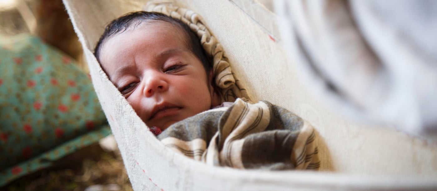 Mansour (two weeks old) was born two days after his family of Afghan refugees returned from Pakistan. That heavily pregnant refugees feel forced to return indicates the desperation of the situation. (Photo: NRC/Jim Huylebroek)