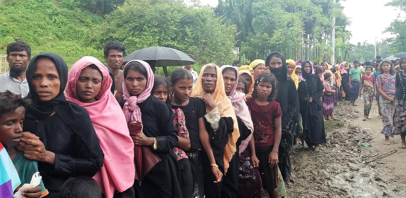 Women and children in a queue to receive High Energy Biscuits (HEB) at Kunchipang, Cox's Bazar (Photo:Bharati Pokharel/NORCAP/UNICEF)