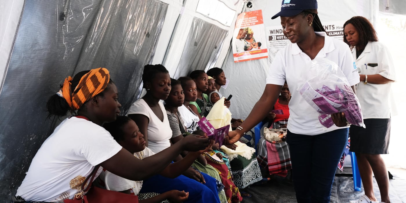 Information session on contraception and family planning at a health facility in Macharote, Mozambique. UNFPA with support from NORCAP expert, Sabine Nana, has set up tents for sexual and reproductive health programs at the health facility. 
(Photo: NORCAP/Oda Lykke Mortensen)