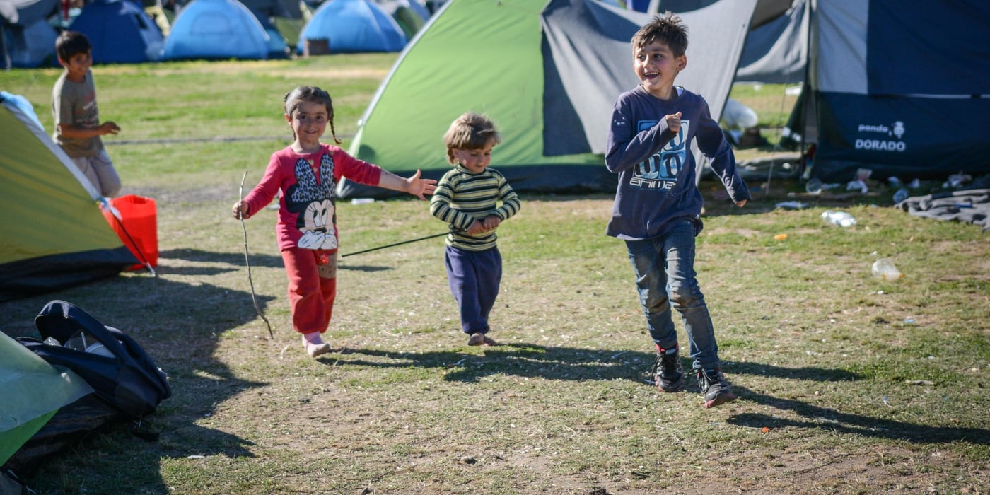 Rima (3) and Abdul (2) at Eko Gas Station close to Idomeni where a lot of refugees and migrants are staying in simple tents. Photo: Tiril Skarstein, NRC