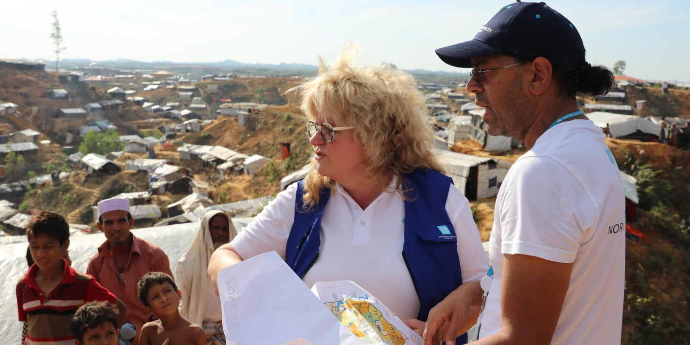 NORCAP Director Benedicte Giaever (left) with site planner Shyam Sundar in Balukhali camp in Cox's Bazar. (Photo: Ingrid Prestetun/NRC) 
