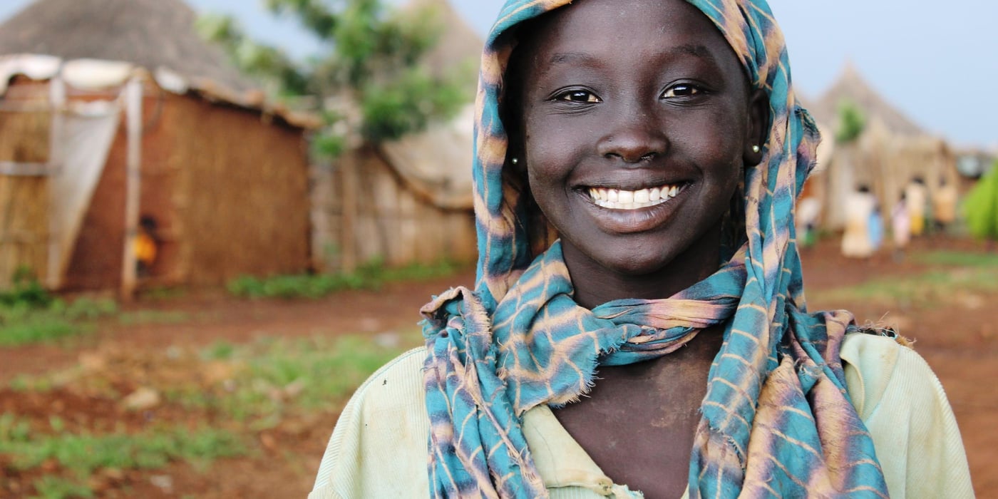 A girl living in Bambassi refugee camp shares a smile with NRC photographer. Photo NRC/Emebet Abdissa. Picture taken in January 2015