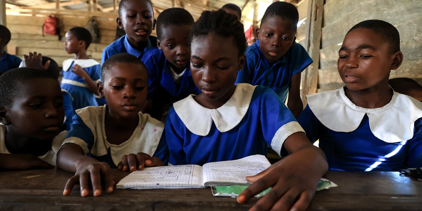 Children attend class in Souza Gare primary school, southern Cameroon. Many students have been forced to flee conflict in their home villages in the North West and South West regions. Photo: Daniel Beloumou/ Education Cannot Wait