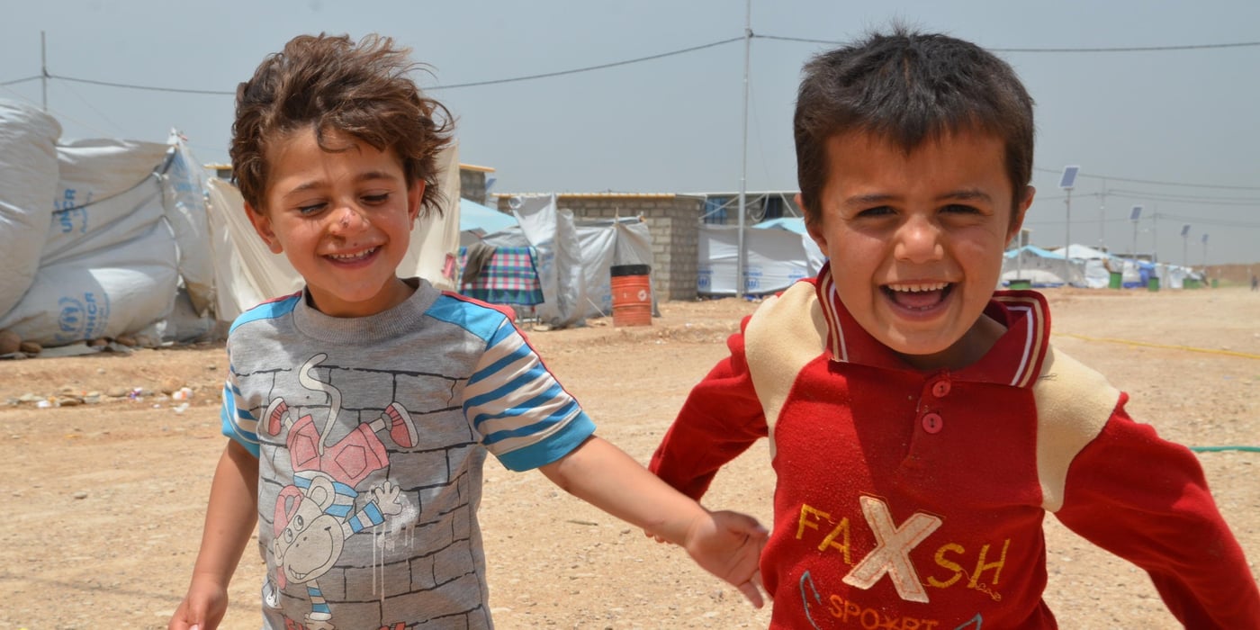 Iraqi IDP children playing in Baharka camp for IDP's in Erbil, Iraq. 

Photo: NRC/Becky Bakr Abdulla