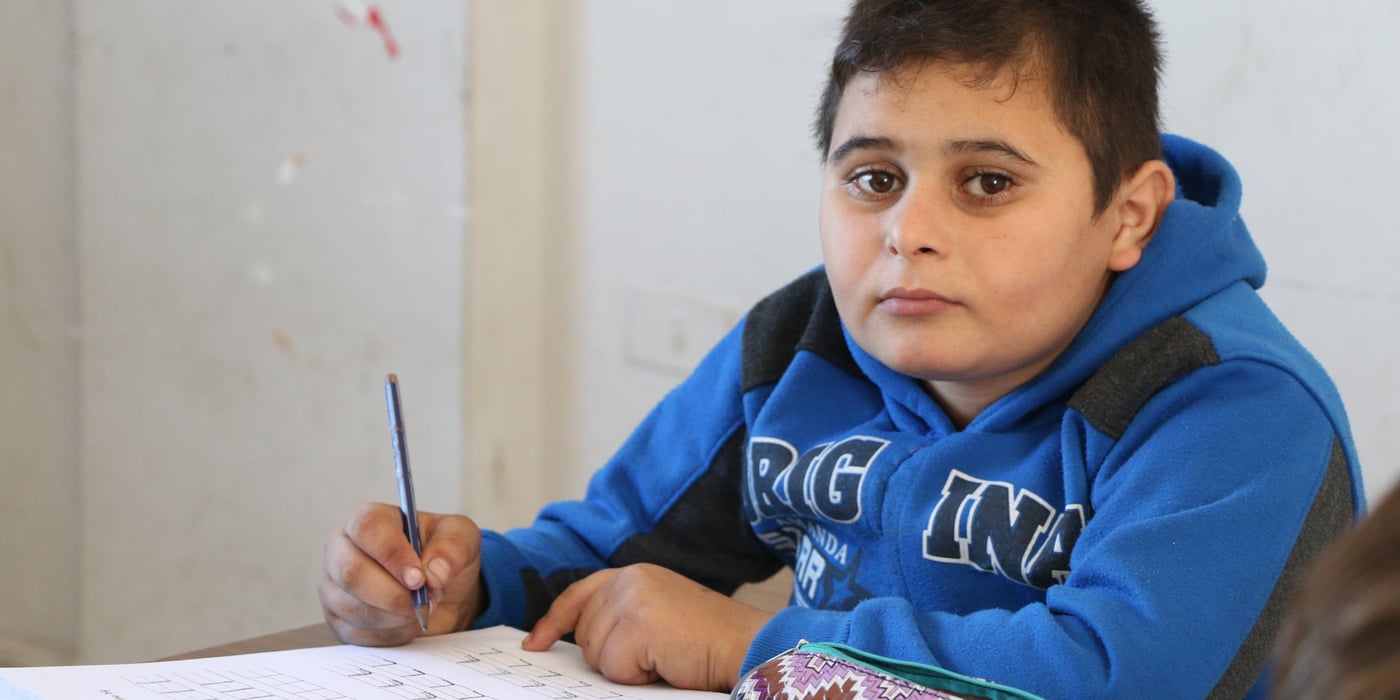 Yazan, is enrolled with the Norwegian Refugee Council (NRC) first cycle of basic literacy and numeracy programme in Lebanon. He is learning English, Arabic, and mathematics. “My favorite subject is Arabic. I think it’s much easier than the English because it’s very hard for me to understand the English words,” Yazan explains.
Photo: Nadine Malli/NRC