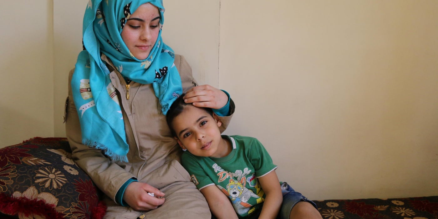 Mariam together her younger brother, Haytham. "I wish the situation would get better and I could resume my really studies,” Mariam says with a smile on her lips. “I only completed the 5th grade and I feel sad that I am not studying,” she adds. 

Photo: Racha El Daoi/NRC
