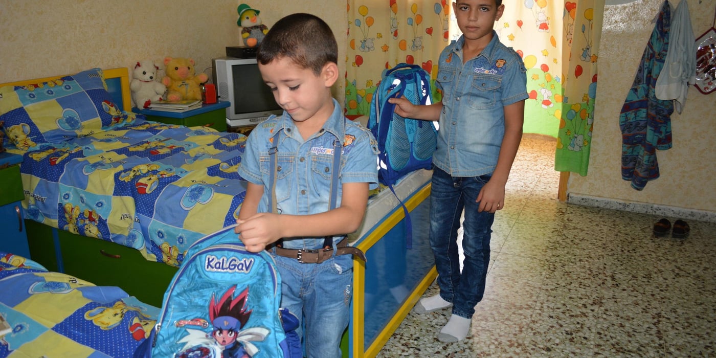 Amir, 9 and Imam, 7 are excited to go back to school, but UNRWA's funding crisis is putting their wishes in jeopardy. Photo: Mazen Naim/NRC