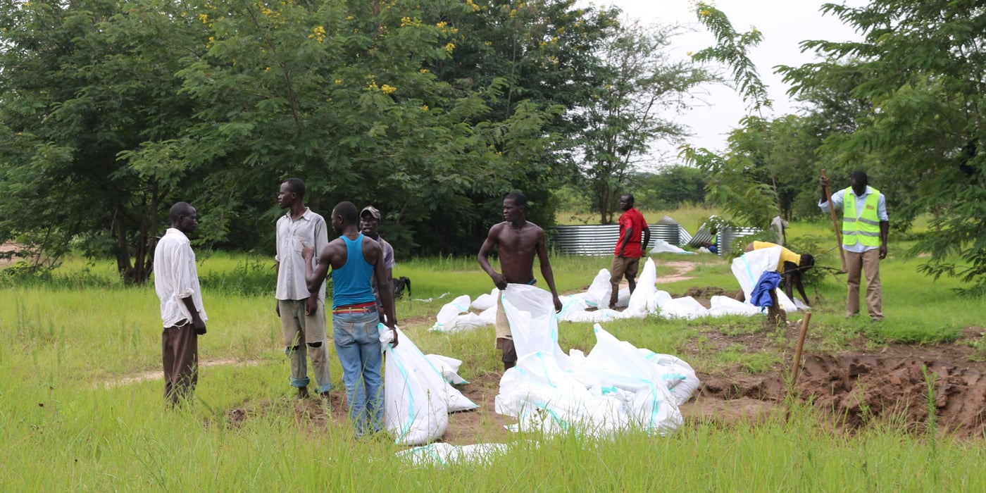Water Tank Construction at Eden Settlement.
(The entire area covering the Refugee response is called Rhino Camp. The transit centre referred to as OCEA. The settlement is called Eden Settlement.)