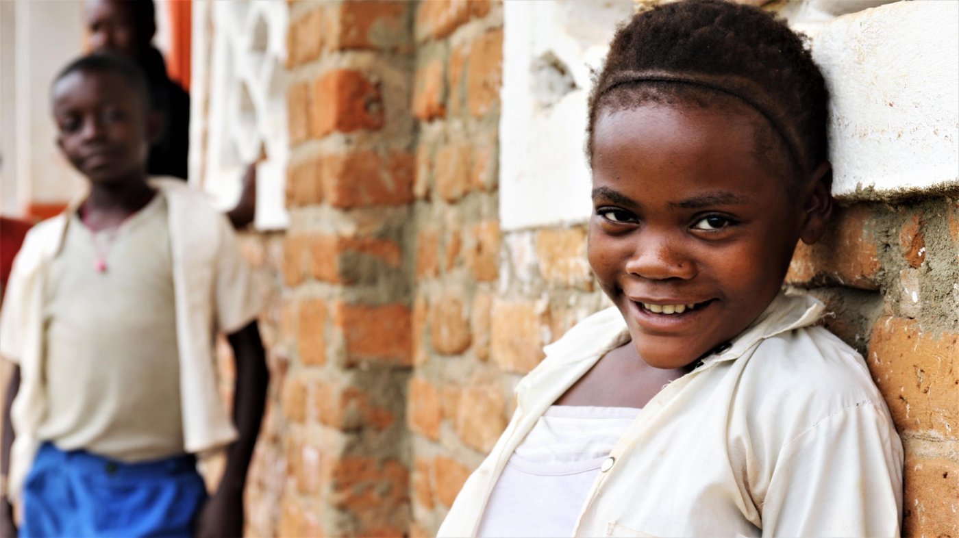 Thirteen-year-old Francine is just one of the 14,000 children who benefited the NRC’s education programming in South Kivu’s southeastern Fizi territory. Everyday Francine attends Asifiwe Primary School in Kanada village in her crisp white shirt and navy blue skirt. During one of the armed attacks, militiamen killed her father. Since then, no one has been able to afford to pay for her education. She was expelled from school due to non-payment of school fees and eventually had to drop out for a year.
“My mother had no money to pay for school,” she says. “I had to stop going to school and help her farm the field.”
In early 2019, she attended the NRC’s catch-up class where she developed her French language skills, math and other subjects. She also received notebooks, pens, a ruler and pencils from the program. Now Francine can read and write in basic French.
To implement the Education Cannot Wait-funded project, NRC has collaborated with Danish Church Aid (DCA) and two national NGOs, Collectif ALPHA UJUVI and Caritas to rebuild destroyed schools, restore proper sanitation and water points in schools. NRC has provided notebooks, pens, pencils and other school materials to children and has trained teachers on psychosocial support. In addition, we paid the final examination fees for students in sixth grade and trained teachers on psychosocial support, Risk Reduction Plans and Training of Parent-Teacher Associations on Good Governance in Schools.
In total, NRC education support has reached 14,000 of children whom the majority are displaced, returnee and destitute children from the community in South Kivu province.
This assistance, however, is only a drop in the ocean, seen the huge needs which are still uncovered in the province and the country. We need further efforts in term of funding so that we continue rebuilding destroyed schools; organise catch-up classes to help many children out of school to get access to quality education in a safe and protected environment.
April 26, 2019
Photo: Ephrem Chiruza/NRC