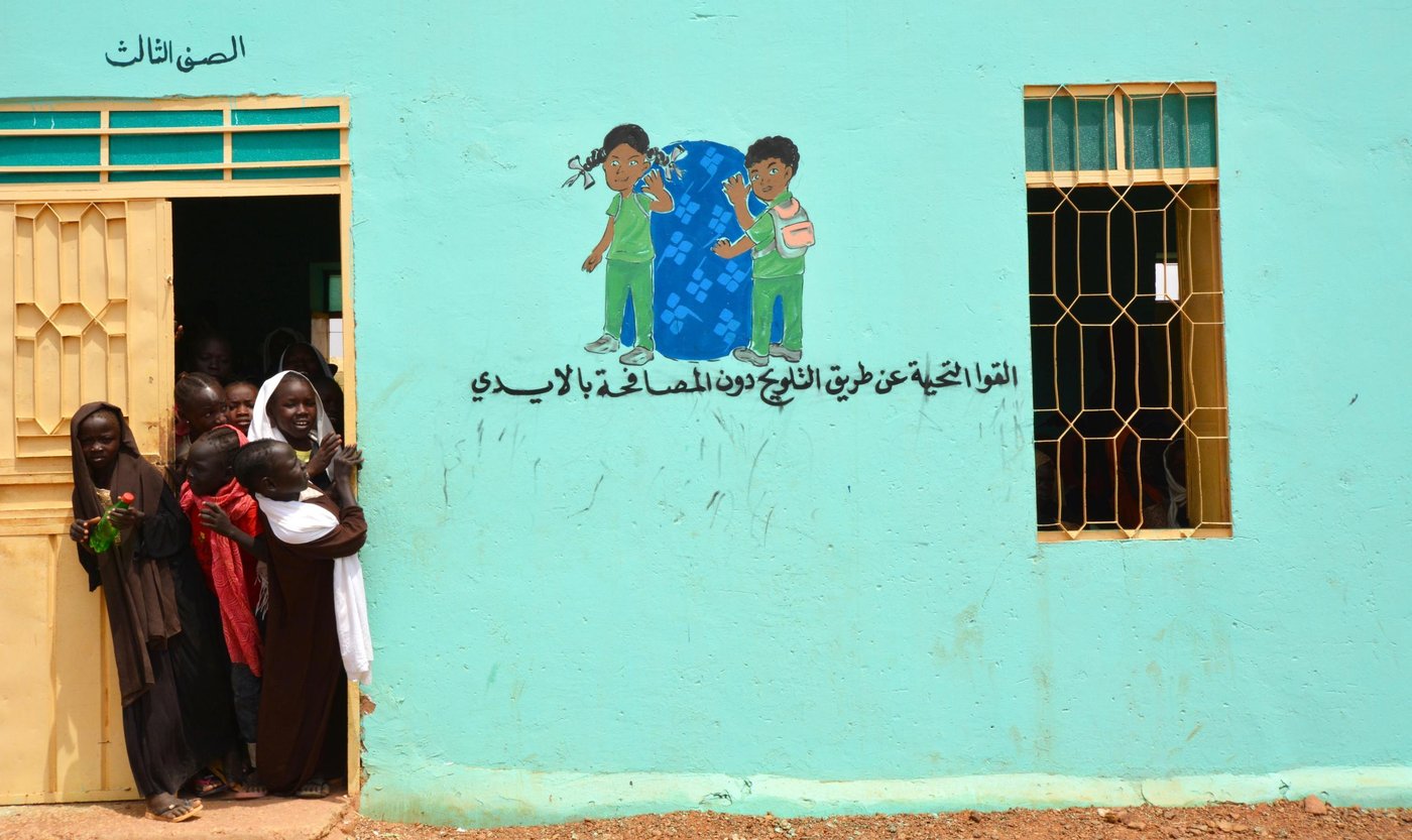 Sept 26th 2021 - Umbada locality, Khartoum 

Before the schools reopened, NRC worked with parent and teacher groups to rehabilitate and upgrade the schools. Here in Umbada School 41 for girls and boys, freshly painted walls display key health and hygiene messages. 

More than a thousand schoolchildren register their names to receive school material in Umbada's school for boys and girls, in the outskirts of Khartoum. 
For many, this is the first time they ever receive school material, such a bags, notebooks, pens and water bottles. The teachers also received supplies to help with their education. Female students from the sixth grade and above received hygiene products. 

Improving the school environment helps to boost the motivation of children, who live in very disadvantaged neighbourhoods.

MathildeVu/NRC