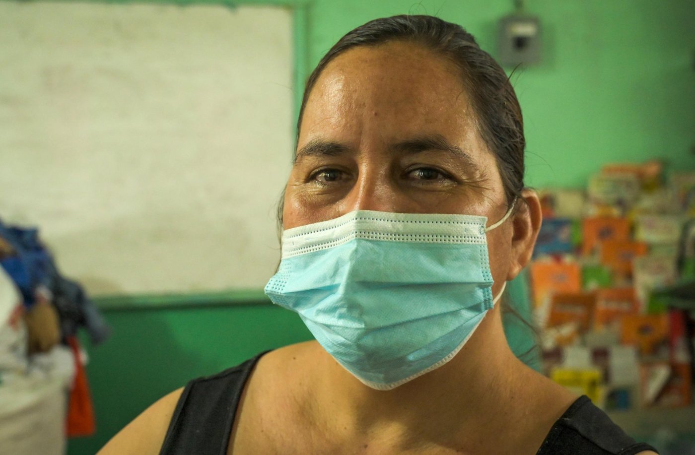 Norma used to live with her husband and two children in a settlement in la Rivera Hernández in the city of San Pedro Sula in Honduras. Their lives were turned upside down, when hurricanes Eta and Iota hurricanes generated strong rains and floods and covered the family’s house in 20 minutes. Now, Norma and her family have found a temporary shelter inside the Alta Gracia Sánchez school in San Pedro Sula, where she volunteers to assist with food distribution every day.
With they received the hurricane alert, Norma and her family evacuated to her mother's house, but the water and mud also caught up with them there. "People began to shout and my husband only saw one way out: “leave everything behind, we have to go now," he said. Norma is grateful to the fact that the whole family made it out from the floods alive. "If this flood had arrived during the night, we would all have lost our lives," she tells.
"Many have lost their houses, and it's going to take us years to rebuild what we lost. The places we used to work are also destroyed, so now we are unemployed," she said.
"The floods arrived without any warning and with such force that we had no time to pack our things. We basically just grabbed our children and left as quickly as we could. It was a moment filled with terror. When the flood came, the only thing we would do was to leave as quickly as we could.”
“Within this shelter at the school, we have many needs. We need bed covers, beddings, medicines, warm clothes and food. There’s many children and old people here that need extra care.”
“At this moment we have nothing. We have no roof, and we are now effectively homeless. So, what we need now is to gather all our strengths in order to rebuild our homes”.
Photo: NRC/Christian Jepsen