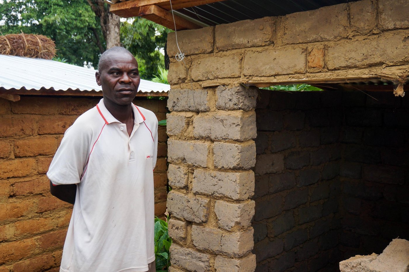 Butunga Apimo, 46, from DRC
Apimo has recently worked with NRC to build a new latrine for himself and his family. It’s lockable both from the outside and inside, so that Apimo and his family can ensure their privacy and exclusive right to their latrine.
Apimo is happy to have received a latrine, but has his heart set on another need for his family: “Can you bring us a water point as well?”
Photo: Guri Romtveit/NRC