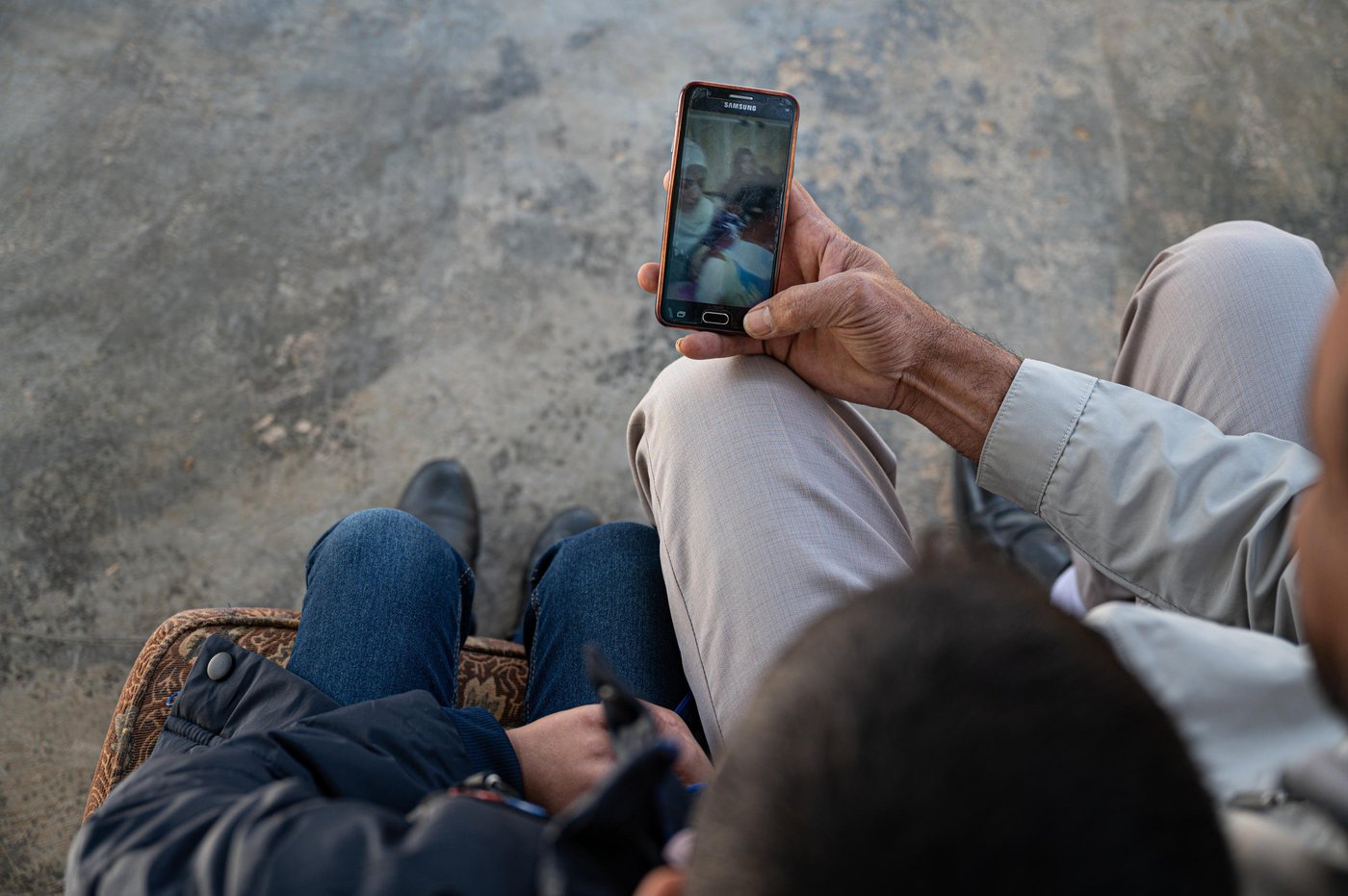 Ten-year-old Osama has not known any other life than being a refugee. He was born two months after his family fled to Za’atari camp in Jordan in 2012.
“When the situation in Syria deteriorated I had no choice than to leave to get my family to safety,” says Osama’s father, Mohammad, 49. “I through we would return after two months but did I never imagined 10 years would pass by and we would still be refugees.”
Osama only knows Syria through the story of his parents. In fact, he has never even met any of his relatives living in Syria. “I show him the videos they send on WhatsApp to me and I tell him who everyone is,” says Mohammed.
“My dad tells me about his childhood in Syria, what our house was like and about my grandfather and that he was a very good man. He always tried to help people and I wish I had met him before he died,” says Osama. “I like to look at pictures of him and see the farm where my dad grew up.”
“My son, Osama, can’t even dream of the future because he has lived in limbo his entire life. I encourage him to study and do sports and take any training opportunity he can get but I really don’t know what type of future he will face if we remain refugees,” Mohammad concludes.
Photo: Daniel Wheeler/NRC