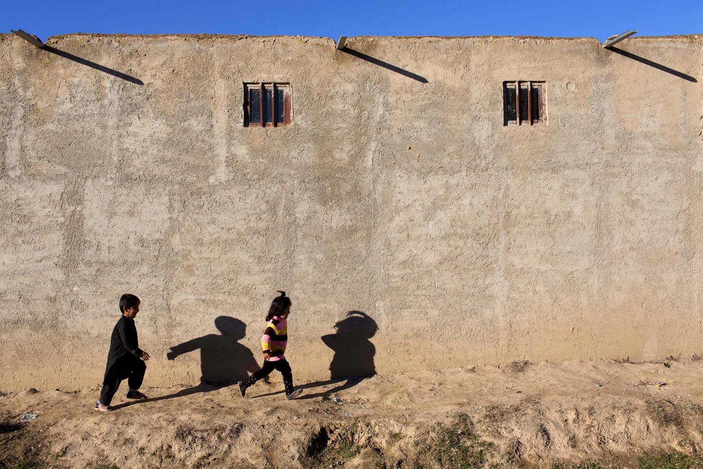 Children play in the streets of Takhali Khana, an area of Maimana mainly inhabited by Internally Displaced Persons. Photo: NRC/Jim Huylebroek