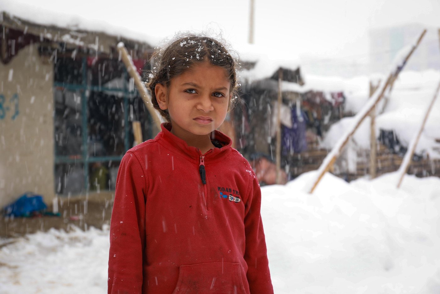 Salma, 9, years old standing in front of her makeshifts in an IDP settlement in Kabul. The first winter snow is falling and she doesn't have proper wearing to brave the cold.
Salama and many other children in this settlement do not go to school and instead, they go to streets to collect scraps and cartons to burn during the winter.
Salma and family has an oven at home burning plastics and other waste materials they can find on the streets. Though this is a third winter that Salma survives in this settlement, but she had gone through a lot of difficulties so far. photo: Enayatullah Azad / NRC