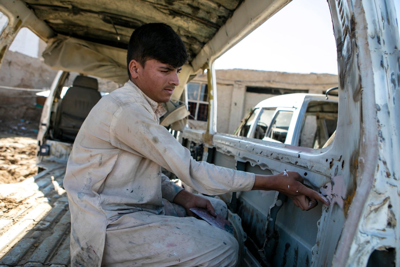 Hassibullah, 18 years old, has been graduated last year from a 9 months training, provided by NRC. 

He is now car painter and starts his own activity in Maimana. He is happy and proud : before the training, he was jobless. He used to work a a daily worker, bu could find job everyday. He earns between 500 and 600 afghanis per day  (approx. $8 -10) - compared to 500 a week before the training - and with his brother, he is able to support his family.