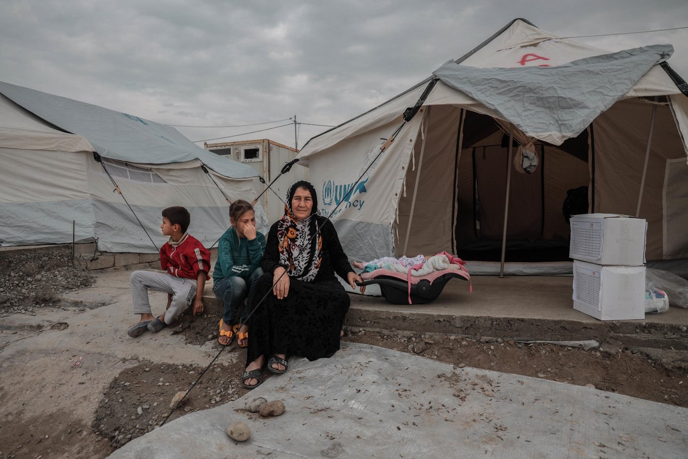26.10.2019
Zubaydah had to flee with her family due to Turkish military operation in northeast Syria. She crossed the border and found refuge in Bardarash camp, where she stays with her children and grandchildren.

"There were airstrikes and shelling every day on Raas Al-ain, many people got killed, we had to flee to survive," she said. 

"When we arrived at the camp, we were exhausted and we had nothing. People helped us a lot, they gave us a tent, mattresses, blankets, hygiene items and food," she added.

As a part of our response, we distributed 250 Hygiene and 250 Dignity kits in Bardarash camp. Our team visited families tent by tent to deliver the kits. In addition, 1,500 mattresses and 250 heaters will be distributed as well as 291 pregnancy kits and 2043 baby kits on their way from Mosul.

"These kits will help us to keep our dignity, that's all we have left. We will be able to wash ourselves and it will allow us to keep the baby clean and healthy," said Zubaydah.

Photo: Alan Ayoubi/NRC