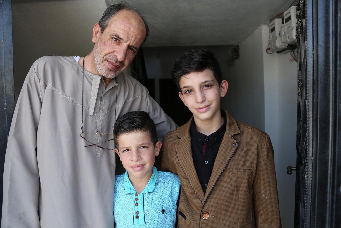 “I’m part of the parents’ committee at Soom school,” explains Ibrahim. “We work on many initiatives that encourage students to attend school and participate in all the activities. It gave them the motivation to return to school. I’m more excited about the new school than my kids. I go to every parents' meeting.” Ibrahim Faris, the father of Ahmad and Mahmoud
Photo: Hassan Hijazi/ NRC