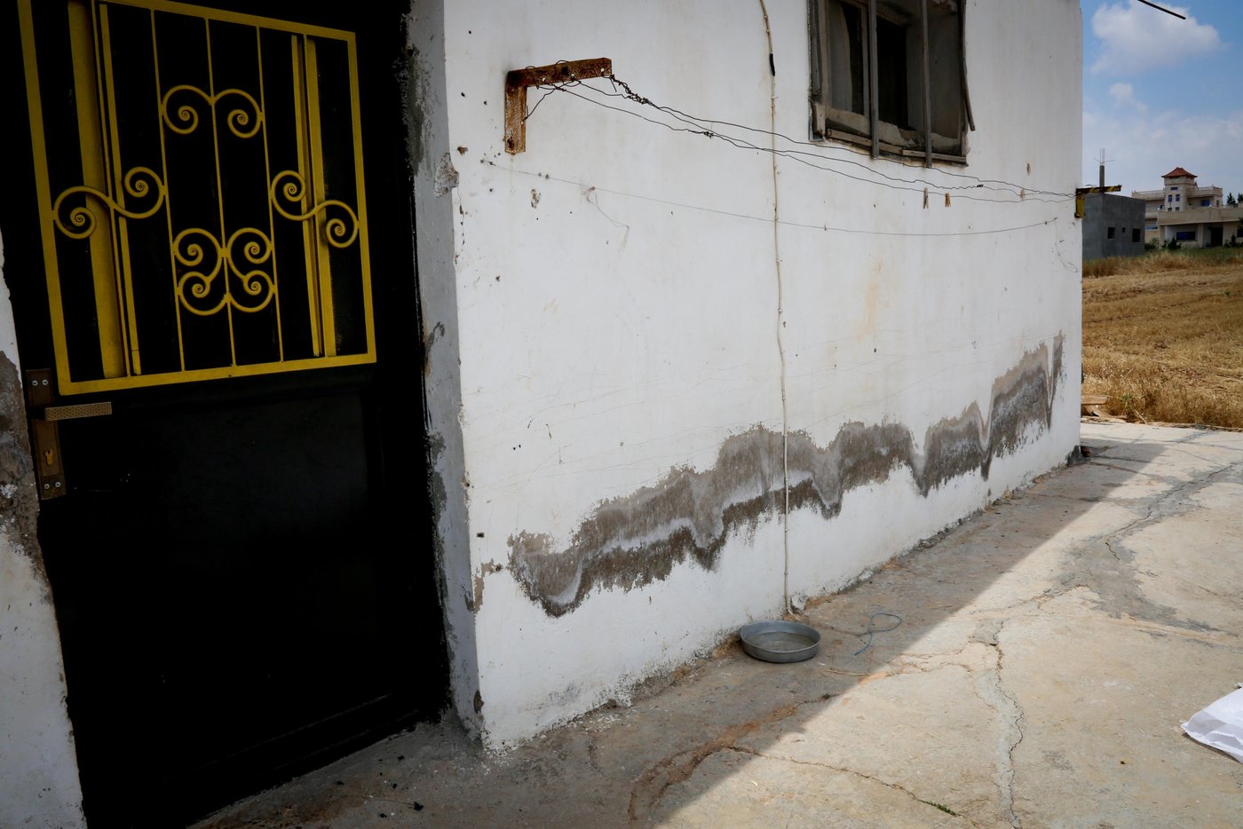 Abu Ayham, 42, and Um Ayham, 40, fled Syria to Jordan five years ago. For the past five years, Abu and Um Ayham have been living in a small brick shack turned home with their four children. Since then, they have endured living disconnected from the municipal electricity network and water services.
“We only had one water tank of two meters for the whole family” explained Abu Ayham. “Also, the main door had an opening in the floor and was allowing bugs and snakes to come inside the house”
“The children would find centipedes and other insects around the house; they were really scared of them” Um Ayham pointed out.
In exchange for the renovation provided by NRC, the landlord agreed on giving the family a six months’ period rent-free. Moreover, after the period is over, NRC will continue to support the family with the monthly payment throughout the next year.
The core of NRC’s shelter program aims to improve the living conditions for vulnerable Jordanians and Syrian refugees living outside of the camps. Rent comprises 50% of household expenses for Syrian refugees and 65% of them do not live in adequate conditions. By upgrading their living conditions and covering housing costs, NRC is creating a win-win situation between landlords and tenants.
Ramtha
13 June 2019
Photo by: Pat Rubio Bertran/NRC