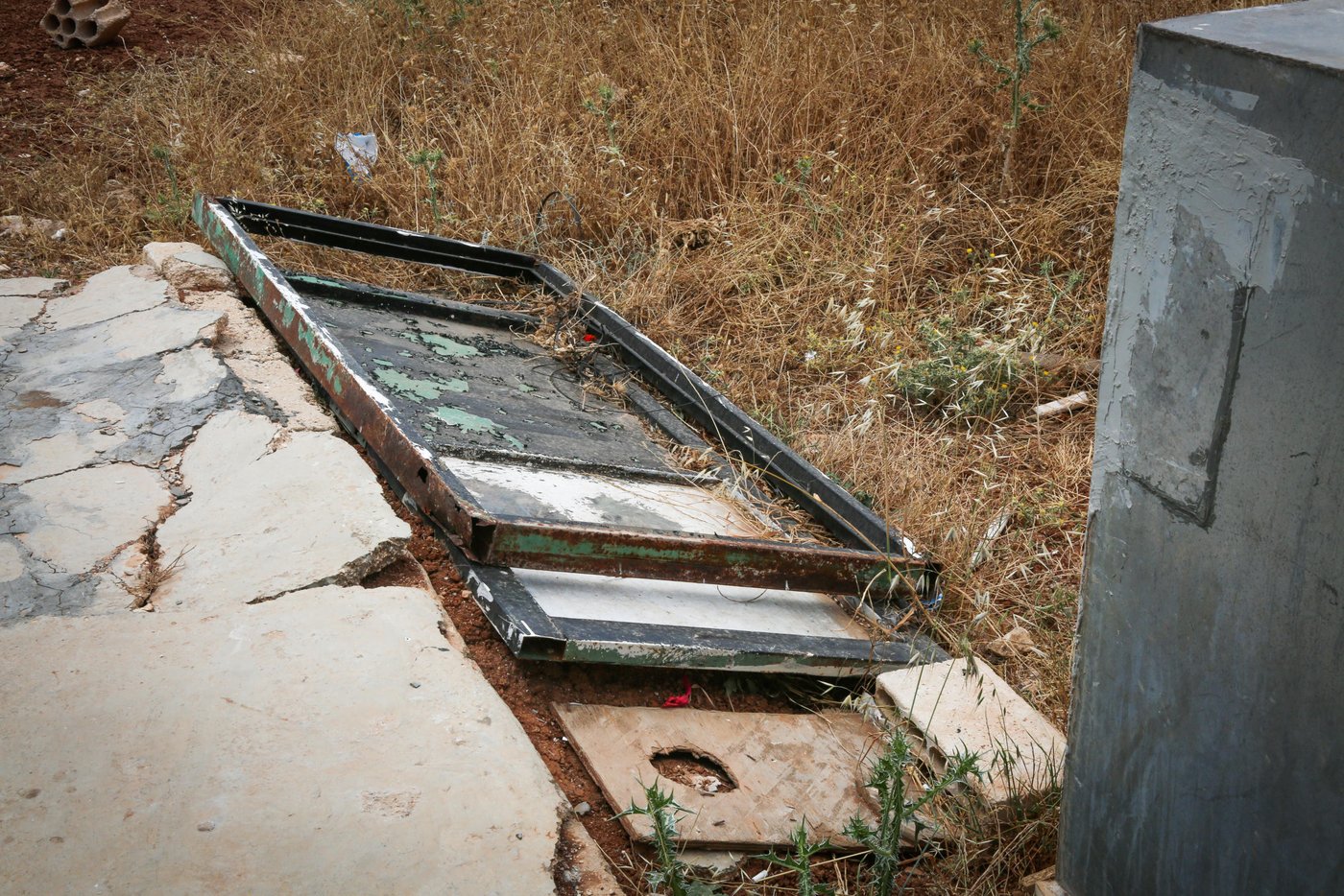 Abu Ayham, 42, and Um Ayham, 40, fled Syria to Jordan five years ago. For the past five years, Abu and Um Ayham have been living in a small brick shack turned home with their four children. Since then, they have endured living disconnected from the municipal electricity network and water services.
“We only had one water tank of two meters for the whole family” explained Abu Ayham. “Also, the main door had an opening in the floor and was allowing bugs and snakes to come inside the house”
“The children would find centipedes and other insects around the house; they were really scared of them” Um Ayham pointed out.
In exchange for the renovation provided by NRC, the landlord agreed on giving the family a six months’ period rent-free. Moreover, after the period is over, NRC will continue to support the family with the monthly payment throughout the next year.
The core of NRC’s shelter program aims to improve the living conditions for vulnerable Jordanians and Syrian refugees living outside of the camps. Rent comprises 50% of household expenses for Syrian refugees and 65% of them do not live in adequate conditions. By upgrading their living conditions and covering housing costs, NRC is creating a win-win situation between landlords and tenants.
Ramtha
13 June 2019
Photo by: Pat Rubio Bertran/NRC