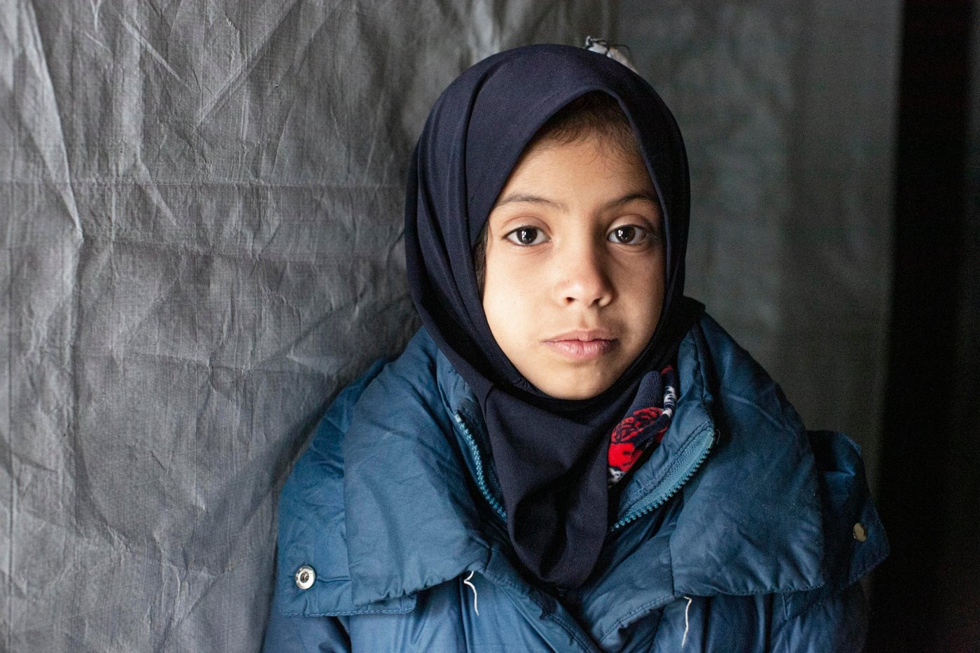 The Norwegian Refugee Council helped the family by installing cupboards and supplying material to cover and reinforce their tent, as well as installing and maintaining toilets in their settlement and supplying drinking water.  

Photo: Sam Tarling/NRC