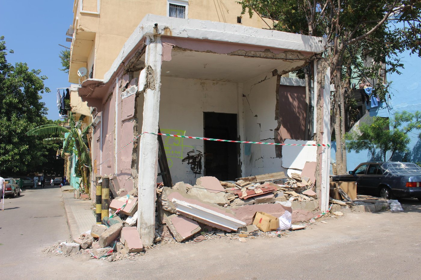 “We have lived in this building for 27 years. I have witnessed all the wars and conflicts in Beirut but never have I seen Beirut so severely damaged as this,” says Hayat. “The scene outside our home looked like a battle field, beyond what you can comprehend. People were running around in panic, bodies on the ground, blood everywhere, buildings falling apart, cars under the rubble and glass shatter all over,” she says.
“We have a lot of needs now, the windows, curtains, and furniture are all damaged. The glass shatters destroyed everything and the walls have fallen down. My kitchen is not functioning and the water pipes are all broken. We need our homes to be repaired urgently but we can’t afford the repairs,” Hayat says. “We don’t know when we will get assistance but we need everyone’s help to rebuild the streets of Beirut,” she says.
“When I look at the destruction around us, I can only say we were saved by a miracle,” says Hayat. “In the end all the material damage can be replaced, we can eventually buy new ones but a life can’t be replaced,” she says.
“Imagine, one of the neighbours in the building next to ours is Syrian. He has been living alone for a while and his family in Syria. A few weeks ago, the situation where his wife and two daughters live in Syria worsened so he brought them here to be in safety and escape the war. But they didn’t escape death, the roof fell over them in the explosion and his wife and two daughters died. If you see him now, it’s like he has gone mad,” she says.
“My husband died when my children were very young and I raised them as a single mother. I put all my heart and effort to raise them and keep them safe. My biggest fear is to lose them now when they are adults. They are my whole life and if something happens to them I wouldn’t be able to handle it. The situation in country has become unbearable. Our hearts are broken, the people are tired and Lebanon has suffered enough,” Hayat concludes.
Photo: Racha El Daoi/NRC