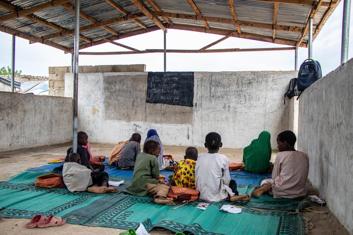 Children in a class where they are taught maths and how to write and read.
Photo: Samuel Jegede/NRC