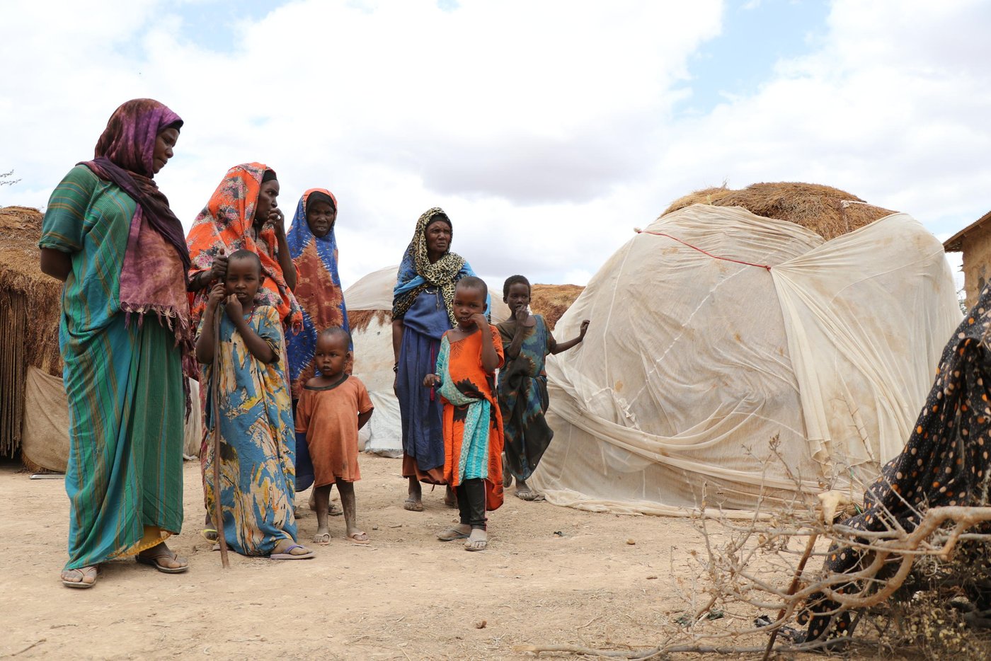 Hudur is a town in the south western Bakool region of Somalia. It serves as the province’s capital and is the center of Hudur town. The main supply routes to and from Hudur town are blocked and are controlled by Al Shabaab. For the last seven years, food and other commodities were transported only by donkey carts but in the last two months, the situation was getting worse.
All roads leading to the main towns of Baidoa, Mogadishu and Beletweyne remain blocked, and no goods are allowed into the Hudur town. The Means of transport available to traders and consumers is airlift resulting in high transportation costs, which further adds the cost of goods to the consumers. The scenario contributed to scarcity and high commodity prices. Rainfall harvesting is a significant source of freshwater to Hudur residents: as such, below average GU rains leading to low crop yields and drying up of (Warcadey and shallow wells), means the situation is fast deteriorating.
According to local authorities and PRMN reports, an estimated population of 4,950 households, comprising 29,700 individuals, are confirmed to have fled their homes mainly from the peripheries of Hudur town. The displaced households were unable to take their belongings and essential household assets. A significant portion of the affected populations were older people, children, pregnant and lactating women, and persons with disabilities, observed mainly arriving on foot or by donkey.
Currently, there are 20 active IDP sites hosting 9,263 households or 55,578 individuals. Compared to the last site verification conducted in April 2021, there was an increase of 3 IDP sites, 4,950 Households or 29,700 individuals. The projected number of people expected to face crisis of (IPC Phase 3 or higher) and would require urgent humanitarian assistance in Hudur for the period July to September 2021 is 21,300.
Hudur town, is under complete siege. The supply routes to and from Hudur town which are blocked and are controlled by Al Shabaab. Food and other commodities are transported by only air which further escalated the price of the commodities to the consumers. Hit and run attacks to the town mainly during night hours, occur and the residents were observing a rehearsal of a big AS attack to the town. For two consecutive years, the livestock and agricultural productivities has been below normal in many parts of Bakool region due to poor rangeland conditions and below-average rainfall, leading to low income from livestock sales and limited household availability of livestock products and local cereal stock.
Most rangeland areas have received below-average rainfall amounts during the last Gu season. The current dry conditions are expected to aggravate the already poor malnutrition status within the Hudur district of Bakool region. There is persistent food insecurity among IDPs and vulnerable host communities in Hudur district with limited operational presence of humanitarian agencies in the area.
A quick solution was needed to respond to this desperate situation, so in 2020, the Norwegian Refugee Council (NRC) implemented the project “Integrated protection response to vulnerable and displaced populations in Hudur district.” This was funded by the Somalia Humanitarian Fund (SHF), and involved in both WASH and protection activities. The WASH facilities has made a huge impact and provided free and safe drinking water to over 13,500 individuals.
Muslimo Abdi Ibrahim, and her family of nine children (3 boys and 6 girls) have been living in Dondardid IDP camp since fleeing from their village in the rural areas outside Hudur. Due to the lack of sufficient water, to save water for only cooking and drinking, Muslimo said that they had to limit the bathing times. They used to take bath only two times a week.
She also said that water was very important for themselves and they needed water more than anything else in their life. Thanks to NRC’s immediate response, Muslimo and the other vulnerable IDP communities in Dondardid camp are no longer to worry about water. They can now access water effortlessly.
“We have free and safe drinking water in our doorstep. I can comfortably fetch enough water. My family can use water for drinking, cooking, washing clothes and bathing. Nothing to worry about at the moment,” she said.
Seven years down the line, since the siege, the communities in Hudur district could not walk the streets at night due to darkness and fear. All business along the main and small streets in the town closed at 5:00 pm in the afternoon. No movement. No social-gathering at all, and the residents locked themselves up in their homes.
“After the sunset, everyone goes home. People could not walk anywhere in the town specially women because of fear. Everything can happen under the cover of darkness, so we remained home,” says Habiba Ali Borow, a local resident in Hudur district.
The Norwegian Refugee Council (NRC) rehabilitated thirty-two solar streetlights in one of the main streets in Hudur district. This was part of NRC’s integrated project funded by the Somalia Humanitarian Fund (SHF). Life for local residents changed since the rehabilitation of the solar streetlights. They are now doing business and socializing on the streets after sunset.
“After years of fear, and being in darkness – the main street has been illuminated. The darkness is over now. When the lights started working. We felt like we get out of a prison, we can walk freely at night to shop or visit friends, relatives and neighbours without any fear,” she said.
Ruqiyo Ibrahim, a mother of seven, and the owner of sells milk along the main street, has seen her small business doubled since the solar streetlights were rehabilitated. Business along the main street including shops, restaurants and small business can now stay open at night as long as there are people who want to shop. It’s a huge blessing to have the solar streetlights and the lighting scheme provided opportunity to all the people.”
“Young people are enjoying tea in outdoor tea-shops because of the solar streetlights. Children are also playing football along the side of the main street, and we thank NRC and SHF for that” said Ruqiyo.
Text: Abdulkadir/NRC
Photo: Abdulkadir/NRC