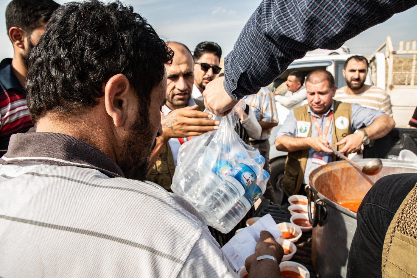 Date: 17 October 2019
Thousands have already fled to Iraq from NE Syria. Our teams in northern Iraq provide water & relief to families as they arrive and before being sent to Bardarash camp.
Photo: Tom Peyre-Costa/NRC
