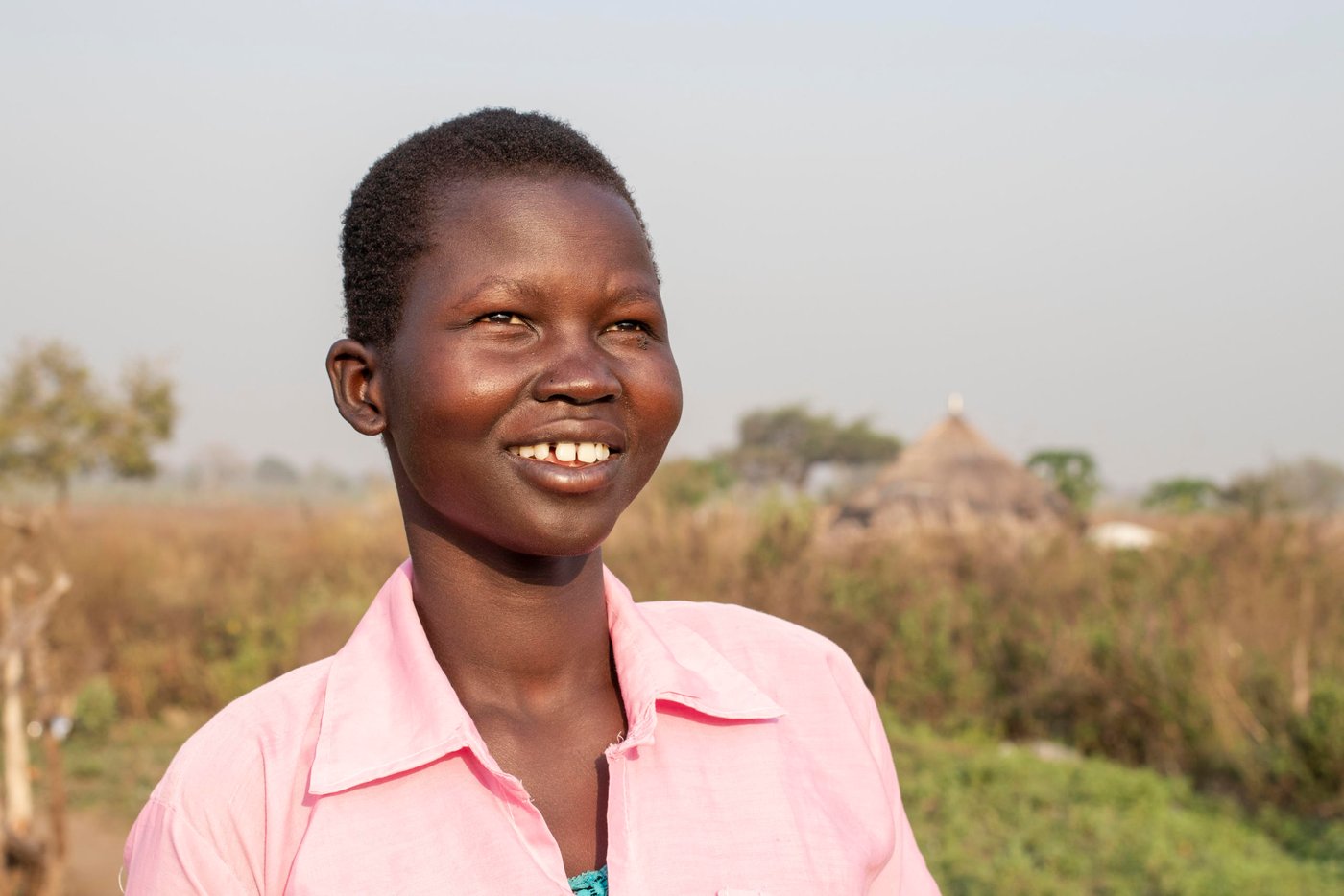 Athieng fled from South-Sudan to Uganda in 2015 with her two brothers and mother, after first staying 2 years in Kenya. They live 25 km from the border to South-Sudan.  

In Nyumanzi Settlement in Adjumani, Uganda Athieng gave birth to twin daughters in 2019 and her mother is taking care of them while Athieng is in school. Her father is still in South-Sudan. 

Athieng is now attending last year of primary school in NRCs Accelerated Education Program. She and her 14 year old brother is attending the same class. AEP in Nyumanzi has more than 200 students from the age of 10 to 20 years. Athieng has a dream to become a nurse in the future.

Location: Youth Center in Nyumanzi Settlement, Adjumani District, Uganda
 Photo: Ingrid Prestetun/NRC