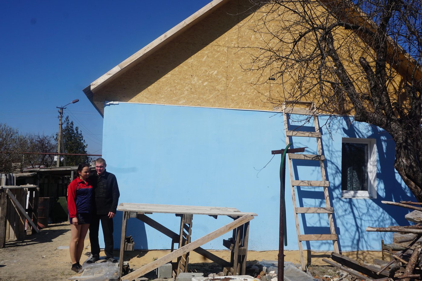 The family moved into their new house in early December 2018, and this is only six months after reconstruction started.
“The builders poured concrete for the foundation, erected walls, made the roof, and we did all the other exterior and interior work ourselves. Construction materials were provided in full,” says Nina.
The Ihnatenko family received assistance from NRC through funding provided by the UN Refugee Agency.
Photo: Anastasiya Karpilyanskaya/NRC