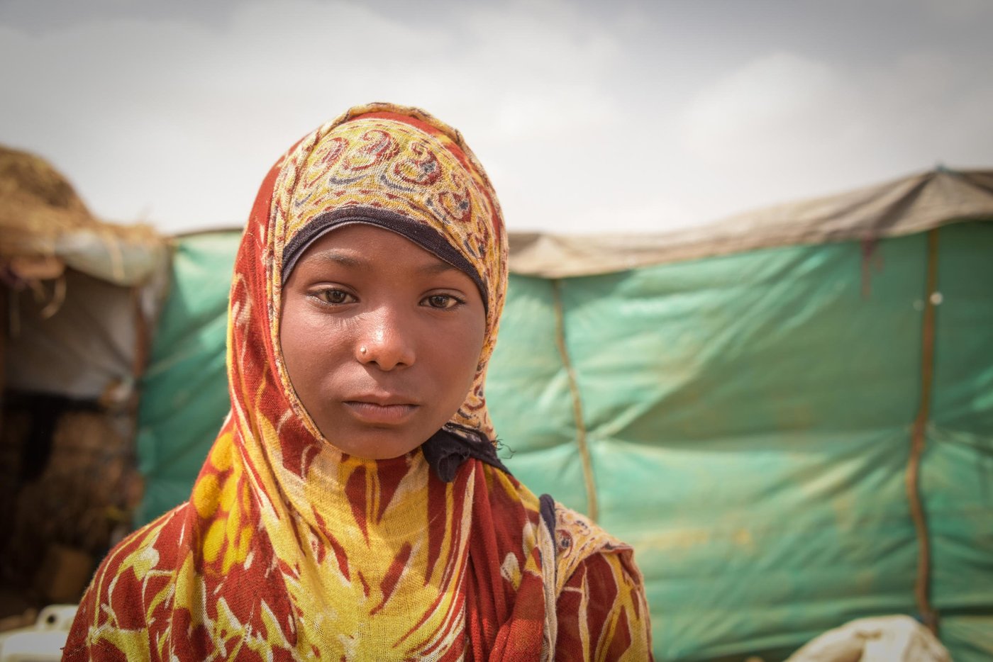Haifa Ameen is 10 years old. She has had to flee with her family multiple times because of the fighting. She is currently living in a camp in Abs district.
"I used to go to school. But now I don’t go anymore. We can’t afford it. It was nice going to school. I felt smart. I was learning to read, but what can I do when my hands are empty? I wanted to be a teacher".
"I want to ask them to stop the war. What’s happening to us is so unfair, unfair for the children and for everybody. We would love to be just like other children outside Yemen, living in safety.”
Photo : Karl Schembri/NR