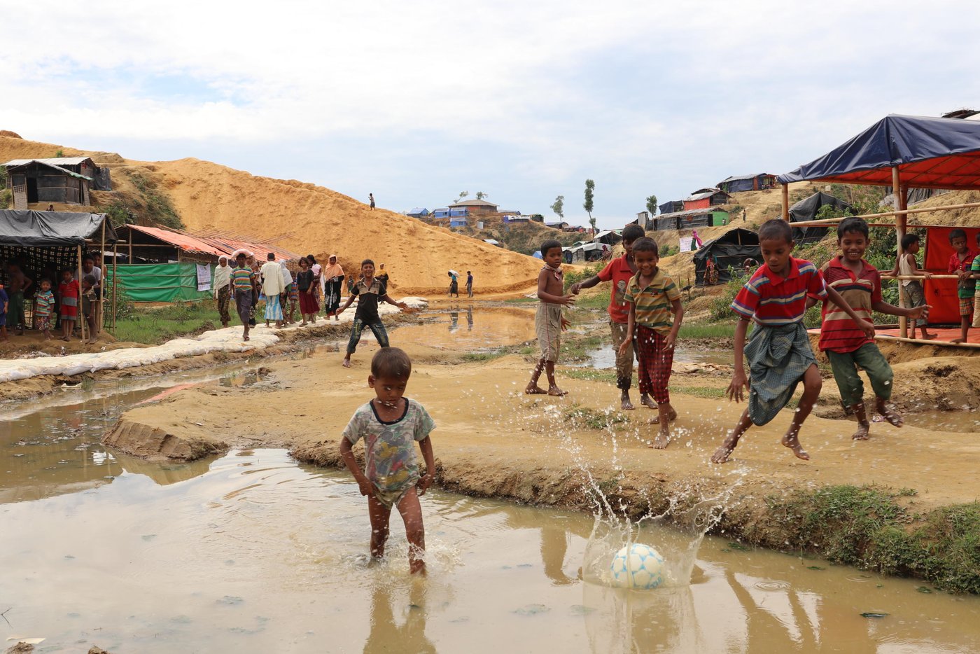 Refugee children playing in the camps in Cox's Bazar, Bangladesh. The area is home to the world's most densely populated camps, giving children few spaces to play and