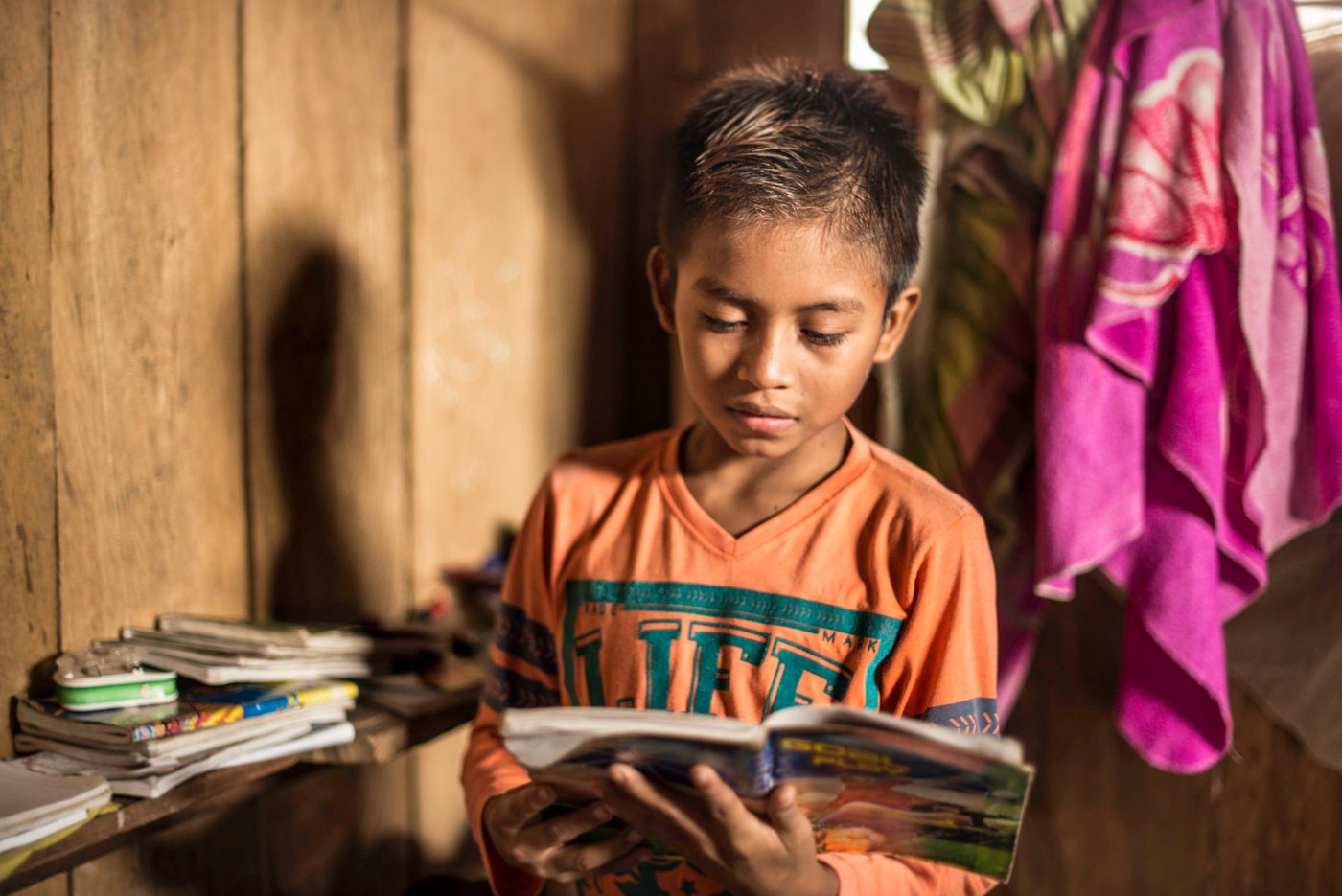Melida's eldest son, Anancio, attends school in Catrú. He misses the animals they had at home on the farm and joining his father on hunting and fishing trips. "We fished using hook and line, and we hunted birds using a rifle. I helped find the animals. We had to be very quiet," he says. 

In October 2017, Melida Isabaré Papelito, 36,  fled with her husband and children from their home to the village of Catrú in Colombia’s Chocó region. The thirty-six-year-old woman is part of the indigenous group Embera and in October 2017, one of their community leaders was killed by an armed group.

"I hope we can get help to survive," says Melida.

Her people have lived in this area for generations. Over the years, they have been displaced several times. 

In October 2017, more than 1,0000 people fled to the village of Catrú in Colombia's Chocó region. 

"They came because they feared that more people would be killed," says one of the community leaders in Catrú, home to the indigenous Embera people. 

The Pacific region, particularly Chocó, has become a battleground for clashes between the National Liberation Army (ELN) and another armed group. Indigenous and Afro-Colombian communities have been disproportionally affected. Seven out of ten people displaced this year come from these communities. 

In many areas previously controlled by FARC, armed conflict is still ongoing. In some areas, the fighting has increased since FARC laid down their weapons, as armed groups are attempting to take control over strategic areas, natural resources and important drug routes. In many places, paramilitary groups have moved in, causing increased fear among the population. Violence has increased throughout the country, as has the number of local leaders being murdered.

The Norwegian Refugee Council (NRC) has been present in Colombia since 1991. In Chocó, we inform indigenous groups about their rights and provide legal aid in questions relating to land rights and compensation after having been forced to flee. In Catrú we help make sure that children get to go to school, and provide clean water to the community.


Photo: Ana Karina Delgado Diaz/NRC