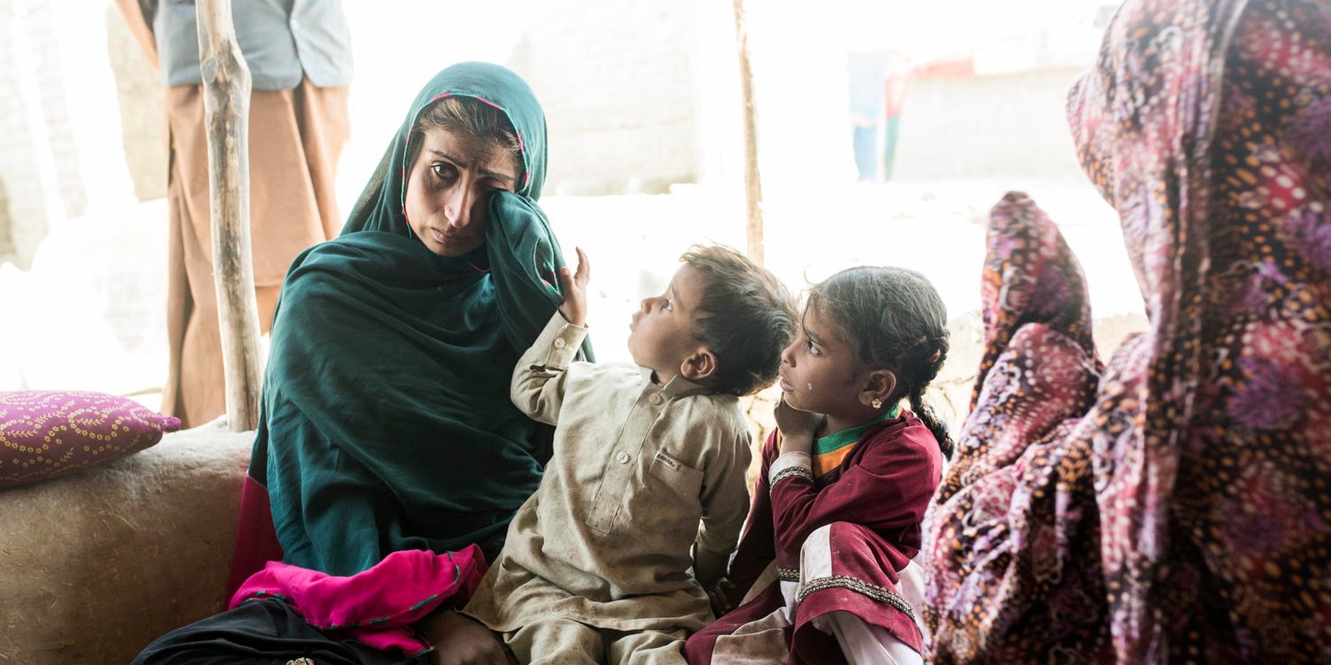 Roxshana, a 23 year old mother of 4 young children, has been widowed by the ongoing conflict in Afghanistan. Five months ago her husband went out to collect firewood, and was inexplicably struck by a stray bullet. Her home village had recently been besieged by fighting between militant groups and the Afghan security forces, and her husband - who did not fight for either side - appears to be one of the many thousands of civilian casualties caught up in Afghanistan’s protracted war. After the death of her husband, she fled with her extended family, including her father in law, to Kabul, to seek the relative safety the capital offers. But with that safety comes slum-like living conditions. She and her children now live in half of a dirty, makeshift shelter in the middle of one of Kabul’s informal settlements. “It’s so difficult here, we just have to take it day by day,” she said. “After my husband died, my dreams died with him.”  Roxshana helps make ends meet by selling cheap plastic bangles, on a good day making up to US$2. This barely covers food for the family, let alone other essentials, like medical care. One of her children is chronically ill from water-borne diseases, which has kept him from attending the local school. “We are completely dependent on the help of others,” she said.
Photo credit: Janus Engel Rasmussen