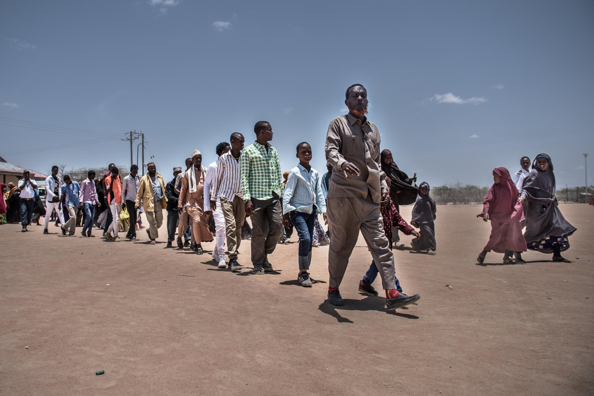 Families board a plane to Mogadishu, Somalia. Over 40 Somali refugee families are returning to Somalia today.

About 23,000 refugees who have left Dadaab camp this year to return back to Somalia. They are part of a return programme set up by the UN’s refugee agency and the Government of Kenya. NRC is working to ensure that people returning to Somalia are given information about the areas they are going to, and that process is well coordinated and returnees are protected. 

Date: September 2016

Photo credit: NRC/ Fredrik Lerneryd