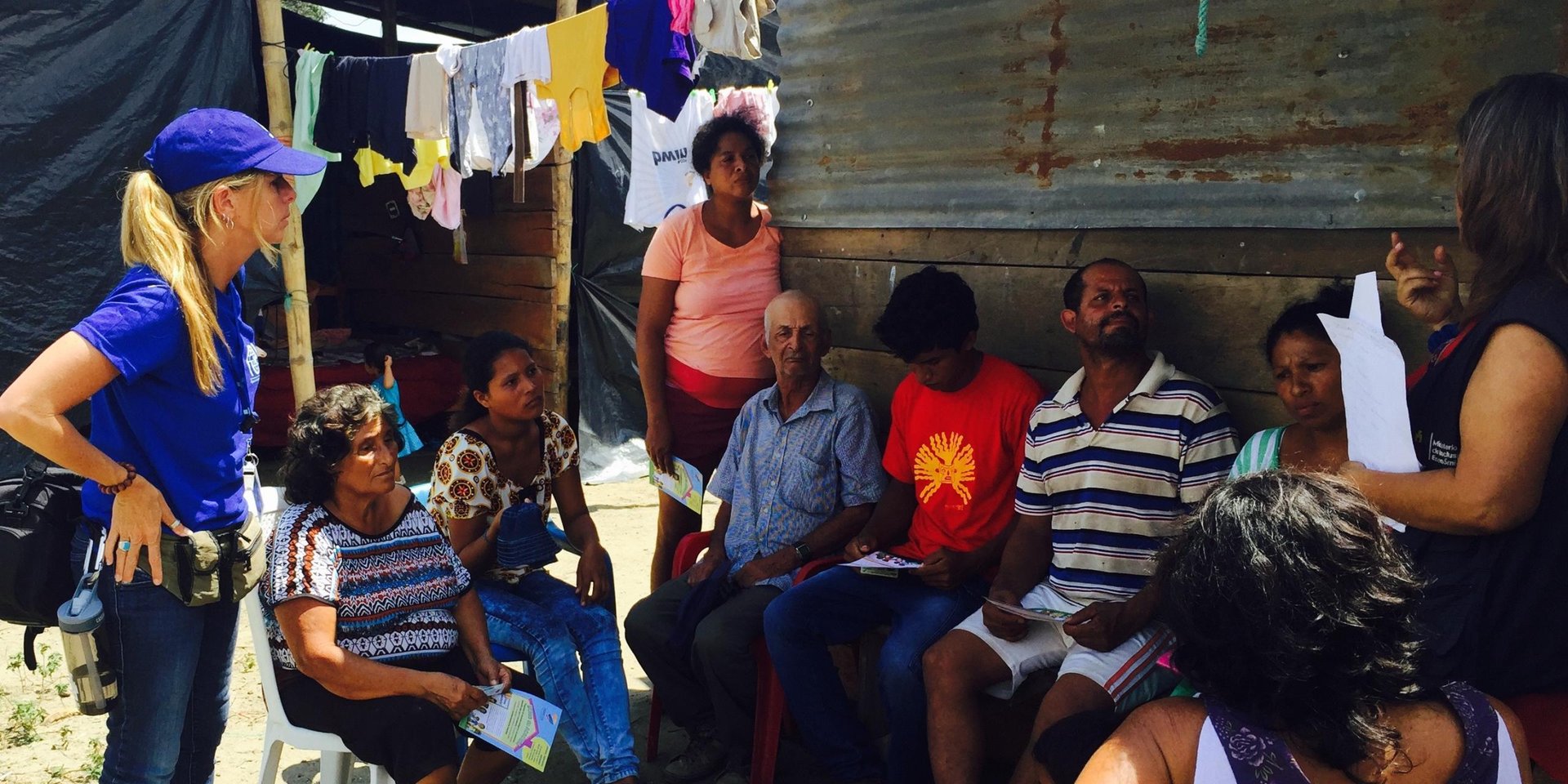 NORCAP/IOM Communication with Communities specialist Fernanda Baumhardt at an urban spontaneous settlement of Pedernales, one of the most affected towns of the M7.8 earthquake, supporting MIES (Ministry of Social and Economic Inclusion) during a community dialogue on government’s emergency programs. The goal was to go beyond socialization, that mostly delivers information, and establish a two-way communication session between community members and MIES representative.
(Manabi, Ecuador, May 2016, photo taken by a community member.)