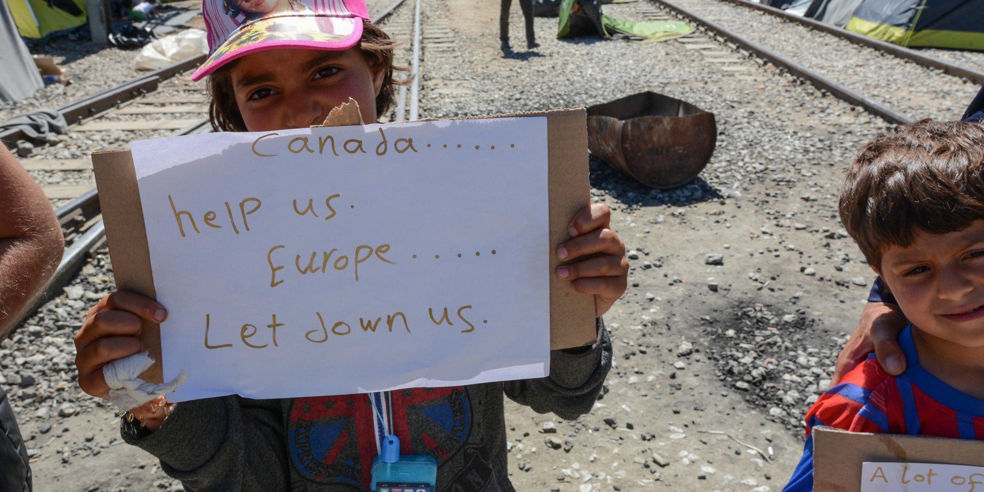 Syrian Amel (10) and Yusef (5) in Greece have a message: Canada help us. Europe let us down... (Photo: NRC/Tiril Skarstein)