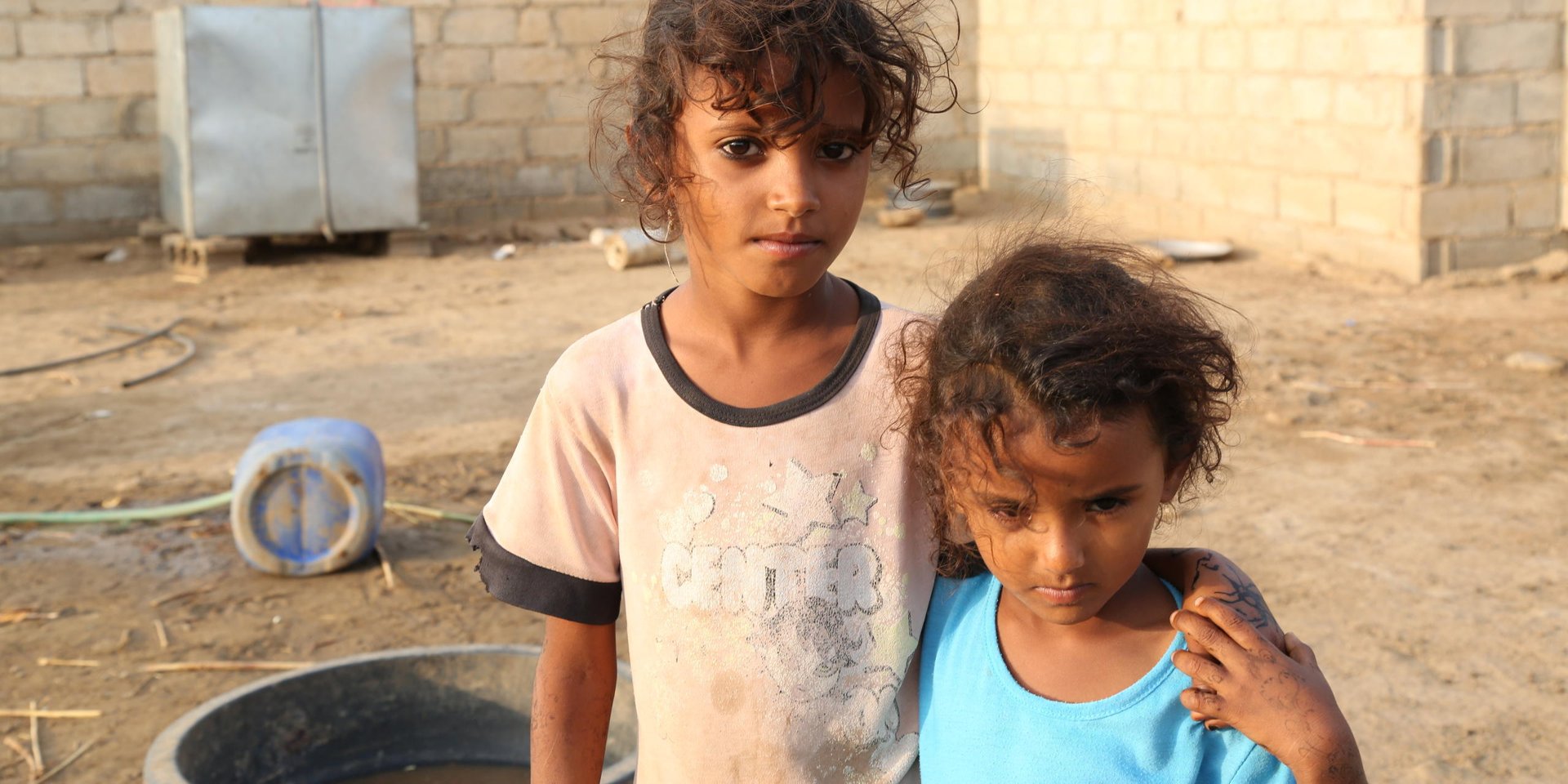 Amina 7 years old and her sister Aisha who is only 4 years old had to flee their home 2 years ago owing to airstrikes with their 35 years old widow mother. They are now living  in an abandoned house in Al-Zuhra District in Al-Hudaydah Governorate. “We came here with empty hands, we did not have clothes or mattresses, we had nothing. When we first came the neighbours gave us some basics to live on.” Their mother A’aish  said to NRC. A’aish is one of NRC beneficiaries she received unconditional cash “My only wish is to ensure my children will live with dignity. I used most of the money I received to buy food and the rest I spend on providing my children with clothes and mattresses” A’aish added.  Photo: Nuha Mohammed/NRC