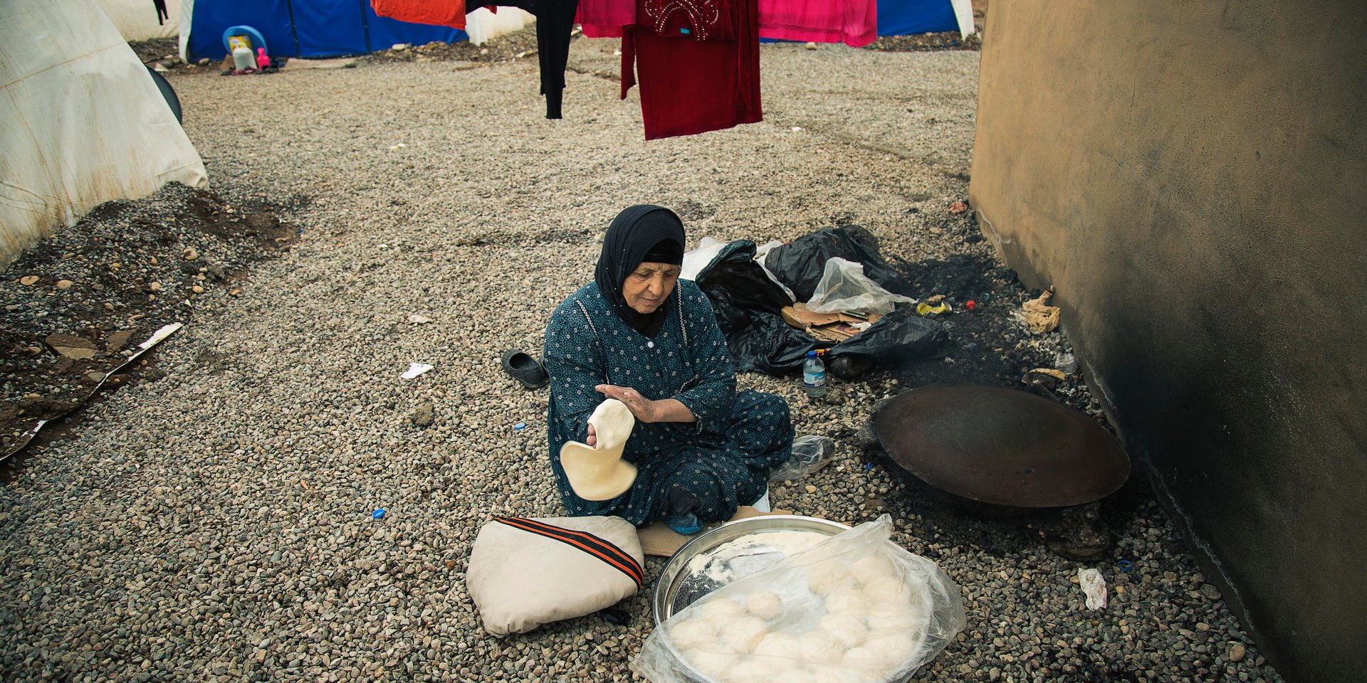 Newly displaced woman from Mosul and surrounding areas in Khazir camp 1 where NRC is present providing emergency aid such as food parcels, water and hygiene kits in addition to school support and safe spaces for children.
Photo: NRC/Hussein Amri