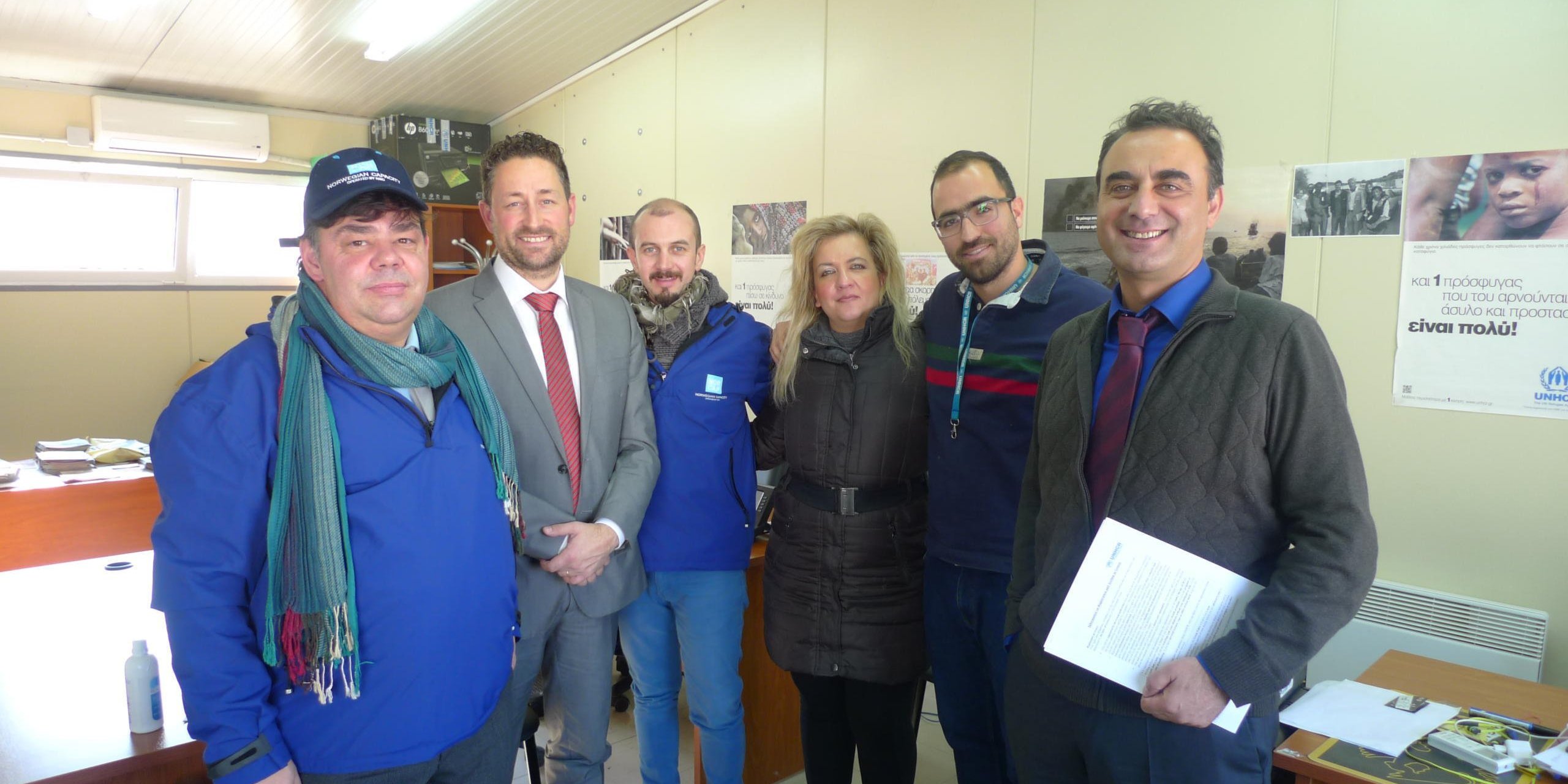 The Deputy Head of Mission from The Norwegian Embassy in Athens, Greece, Mr. Roger Jørgensen, visiting the First Reception Centre in Evros and the NORCAP experts currently deployed there.
(F.l): Dionisio da Silva (NORCAP expert), Roger Jørgensen (Charges d'affaires, the Norwegian Embassy in Athens), Nikolaos Kyfonidis (NORCAP expert), Irini Logotheti (Fylakio FRC), Margaritis Petritzikisand (Fylakio FRC) and Ioannis Tavridis (NORCAP expert).